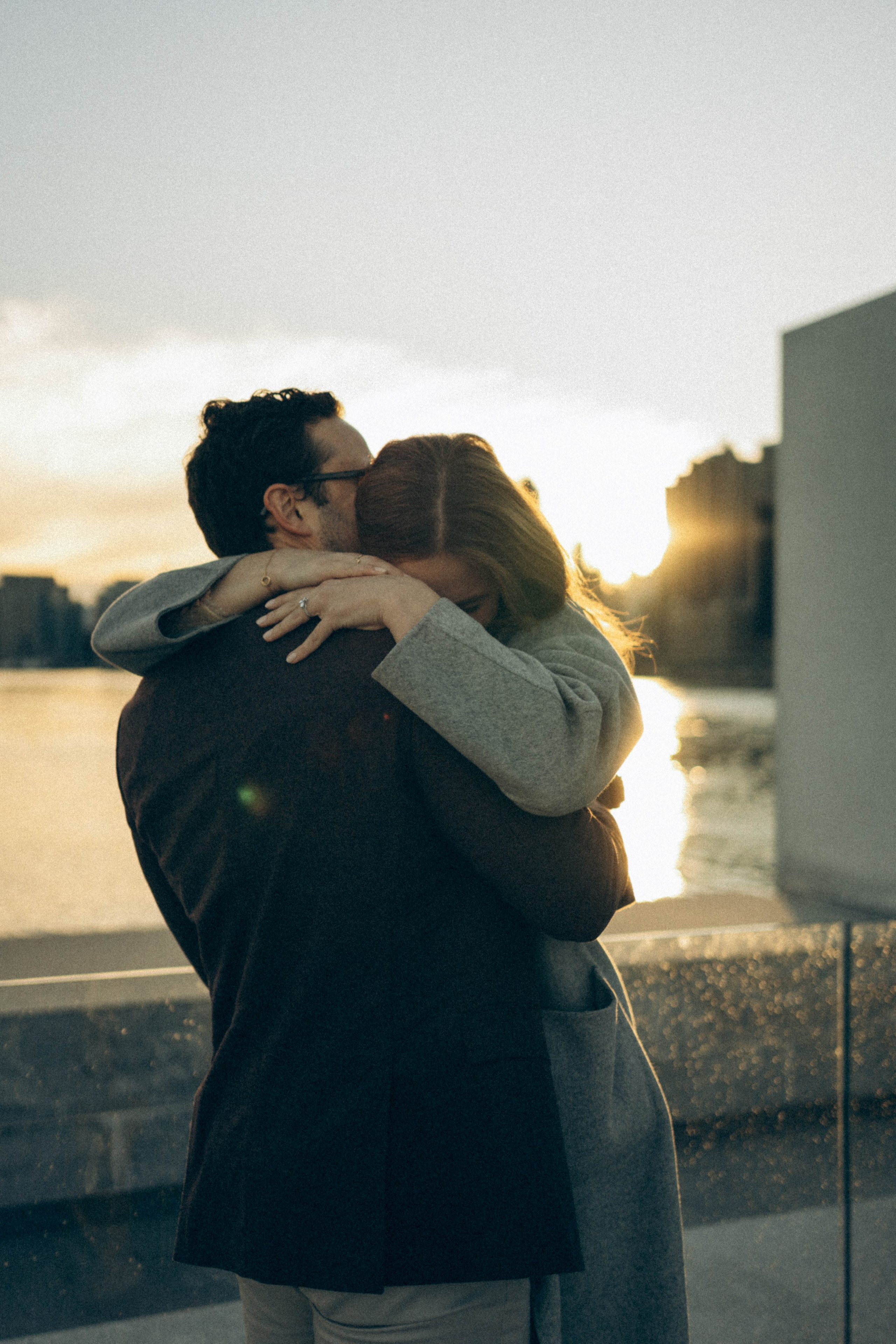Proposal ring close-up with Manhattan lights blurred.