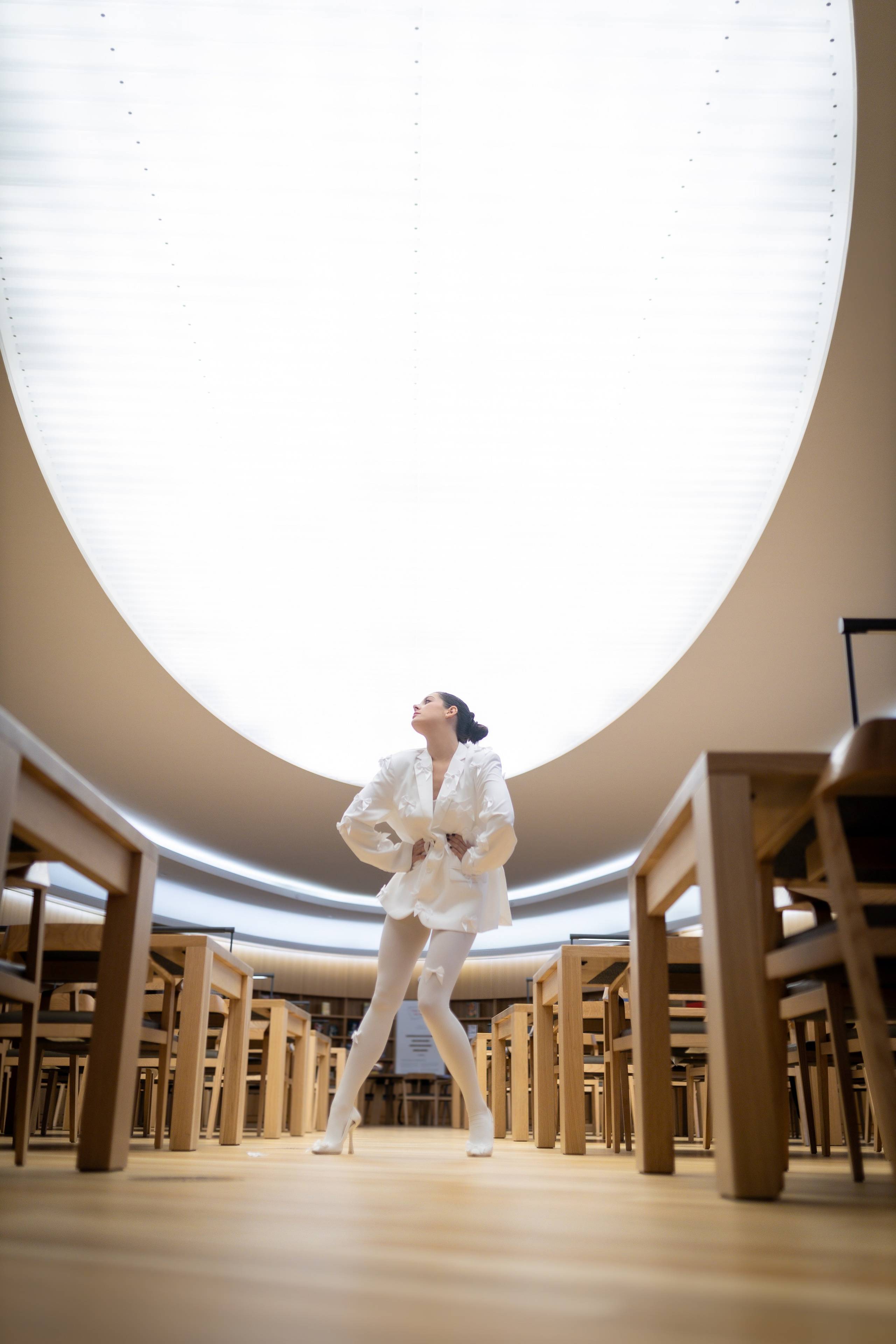 Bold & Timeless: Shelby Morisseau’s Unstoppable Elegance in White. ProFly.club — Professional aerial filming in Calgary