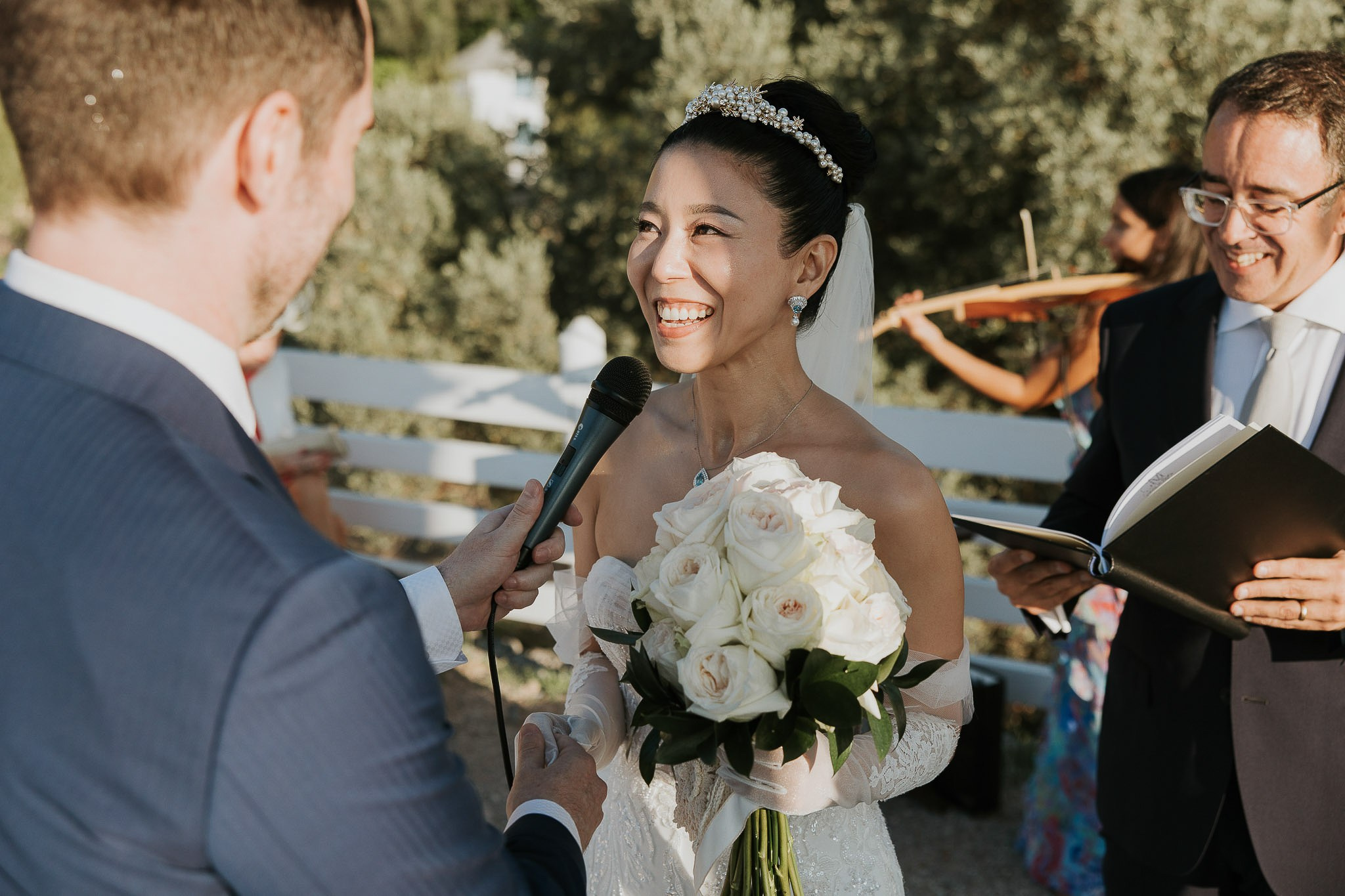 Bride smiling during personal vows Mallorca