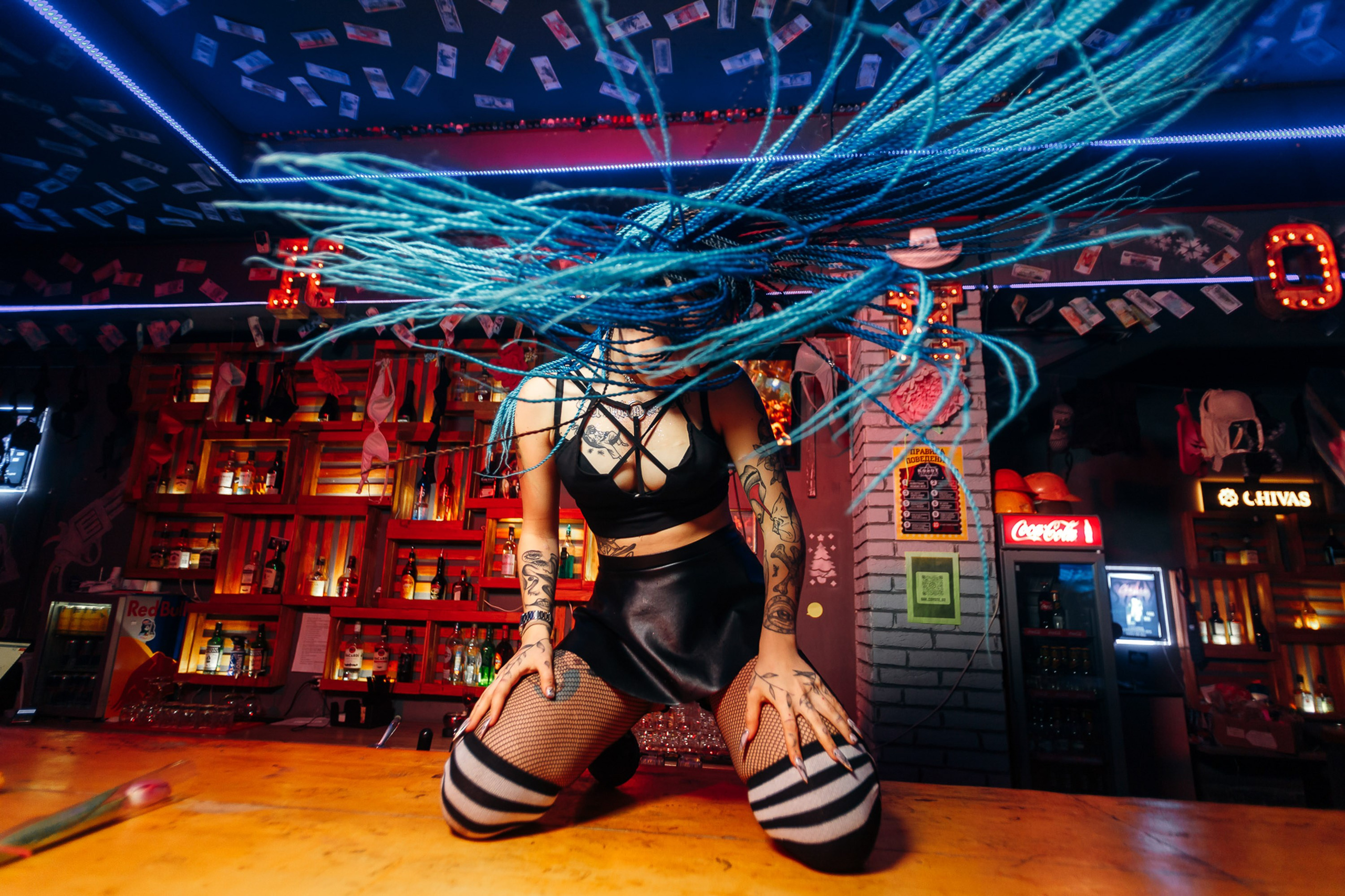 PJ performing on a bar at a party