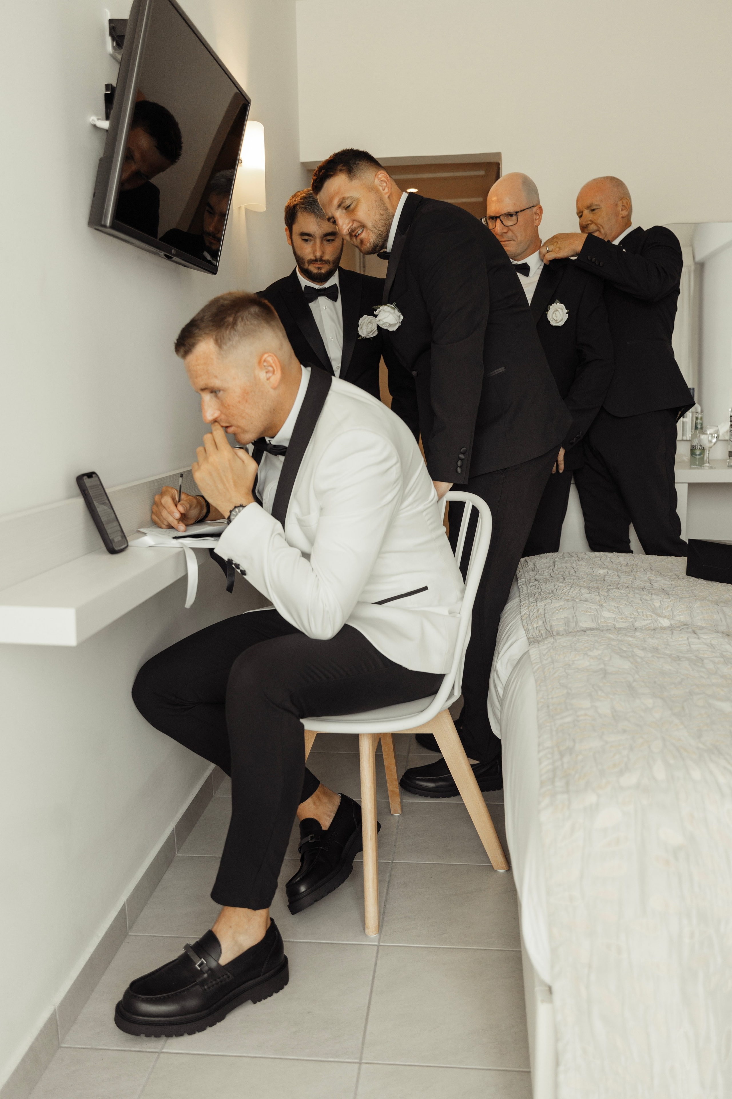 The groom writes a vow to the bride before the ceremony. Rhodes, Greece