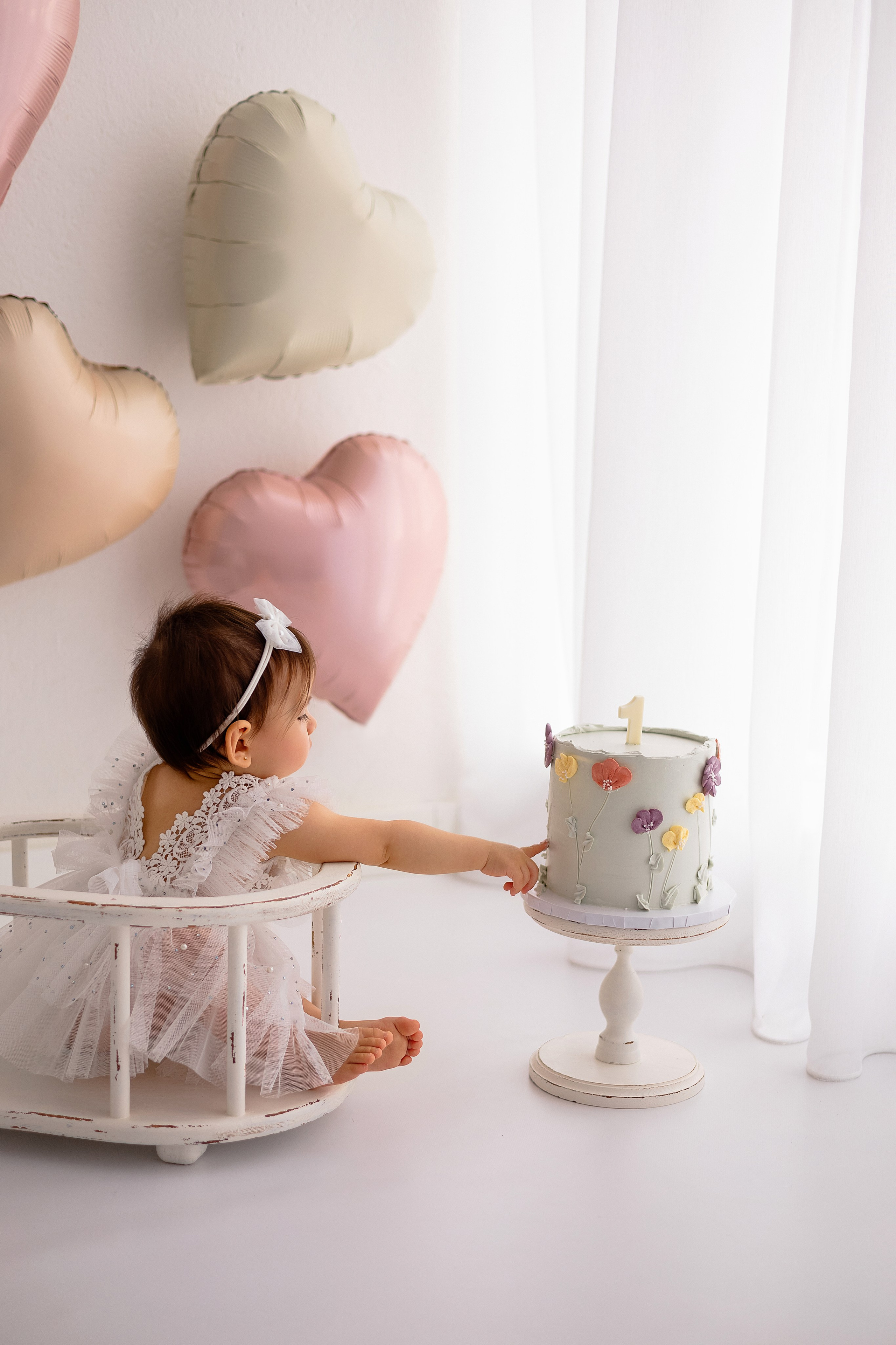 Erste Geburtstag „Cake Smash“. Neugeborene- Schwangerschaft- und Kinder Fotografin in Lehre