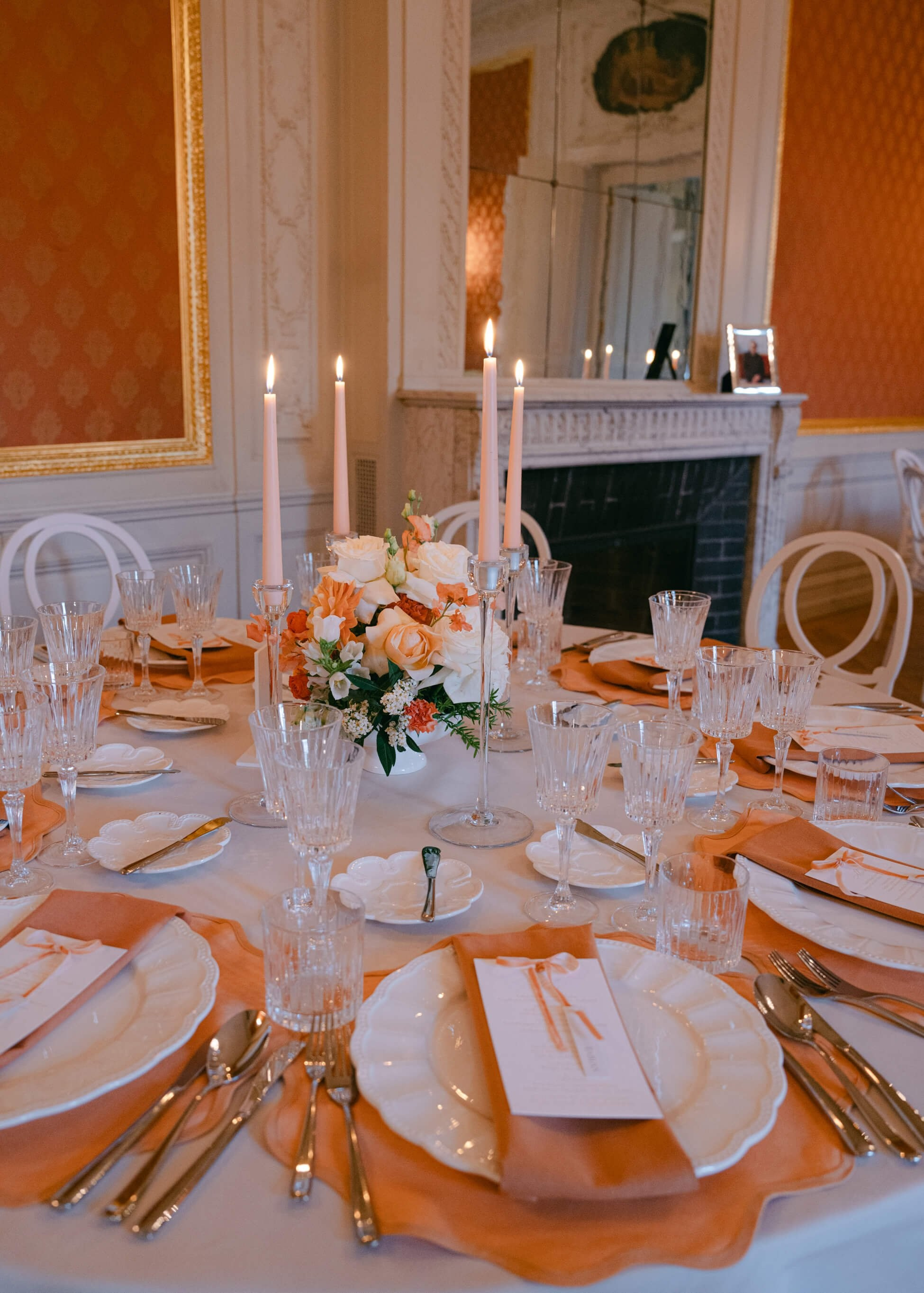 Luxury wedding reception tables with peach florals, crystal glasses and tall candles, Villa Rothschild Frankfurt