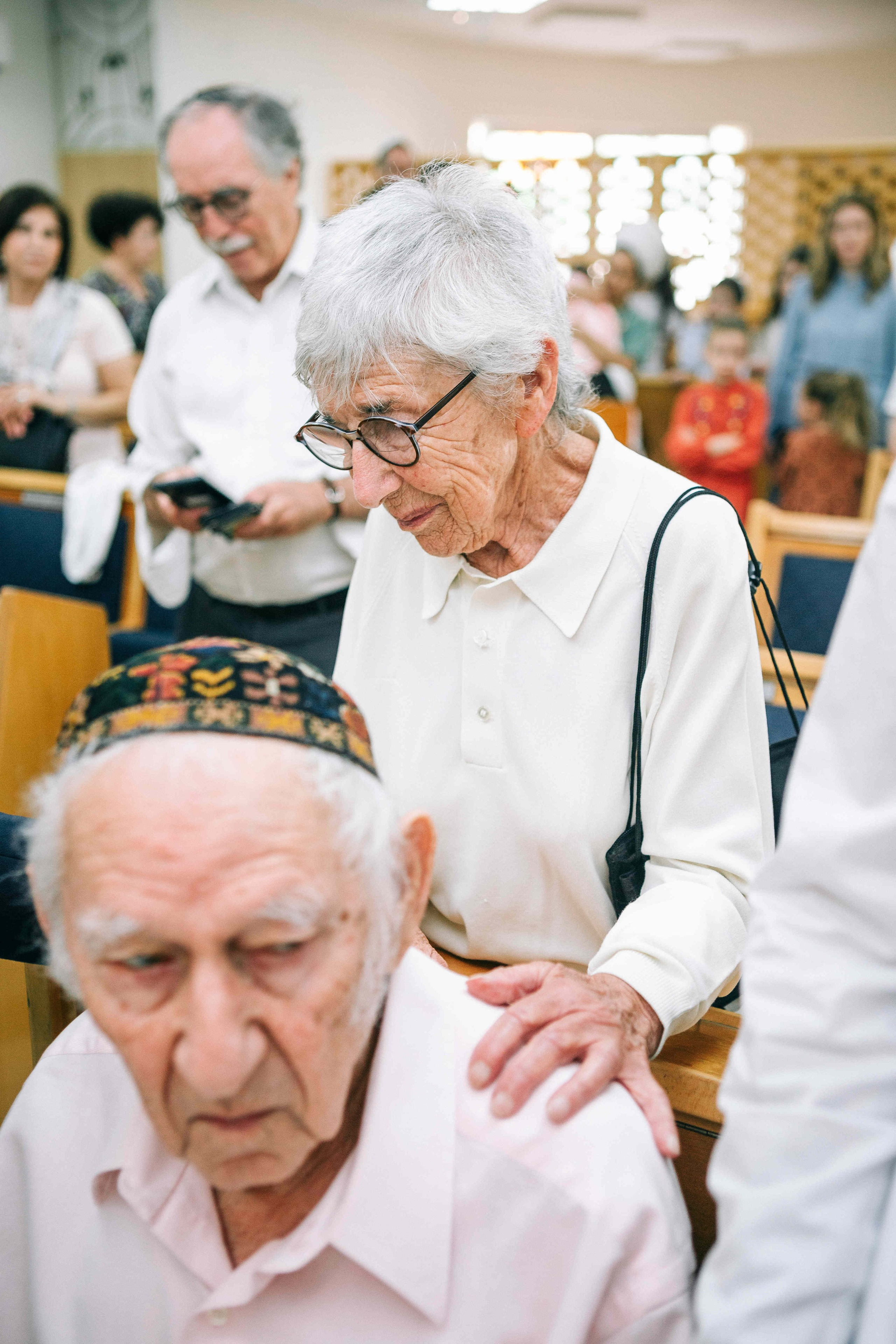 BRITH MILA IN THE SMALL SYNAGOGUE. PHOTOGRAPHER IN ISRAEL