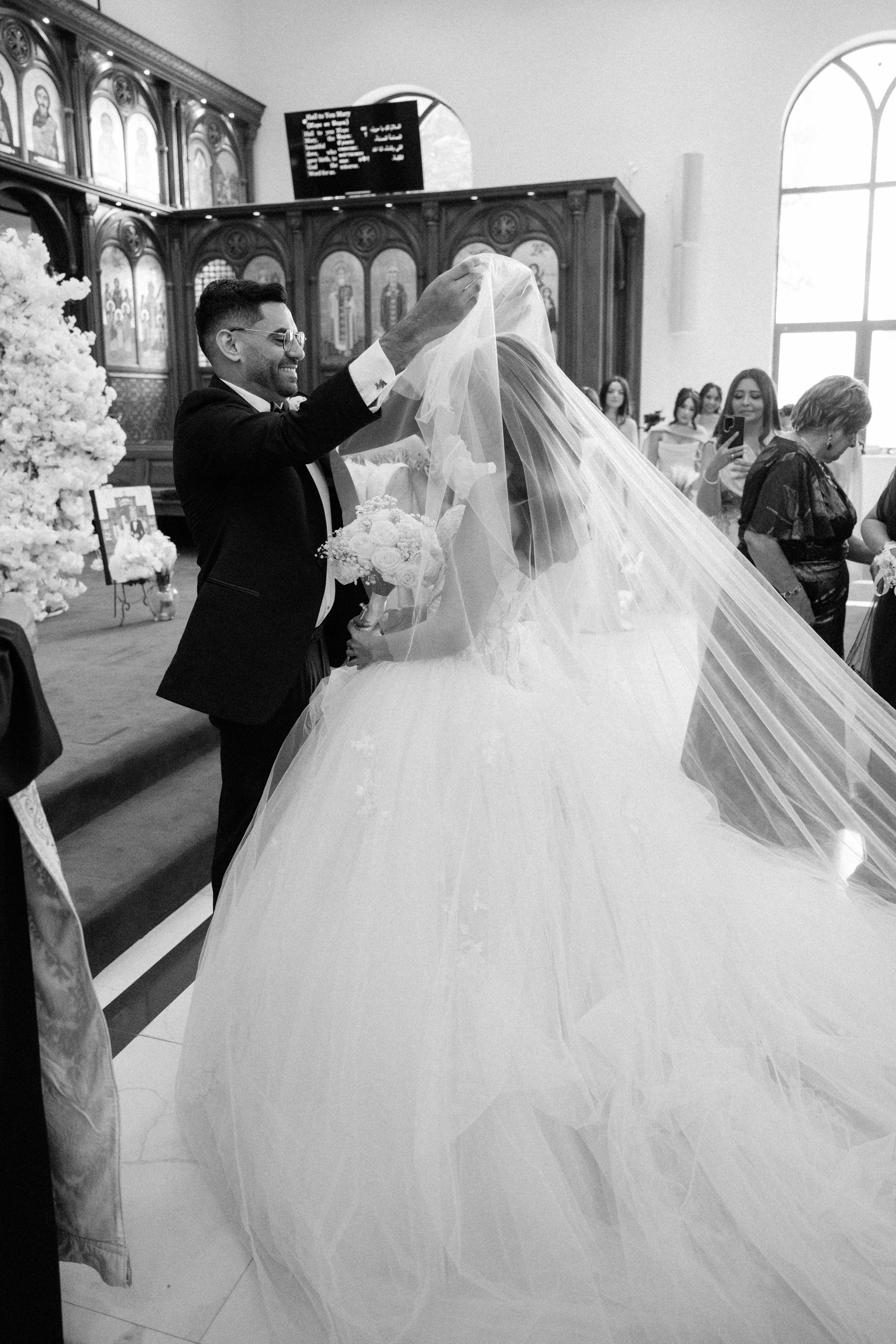 Black and white moment as bride enters the church ceremony