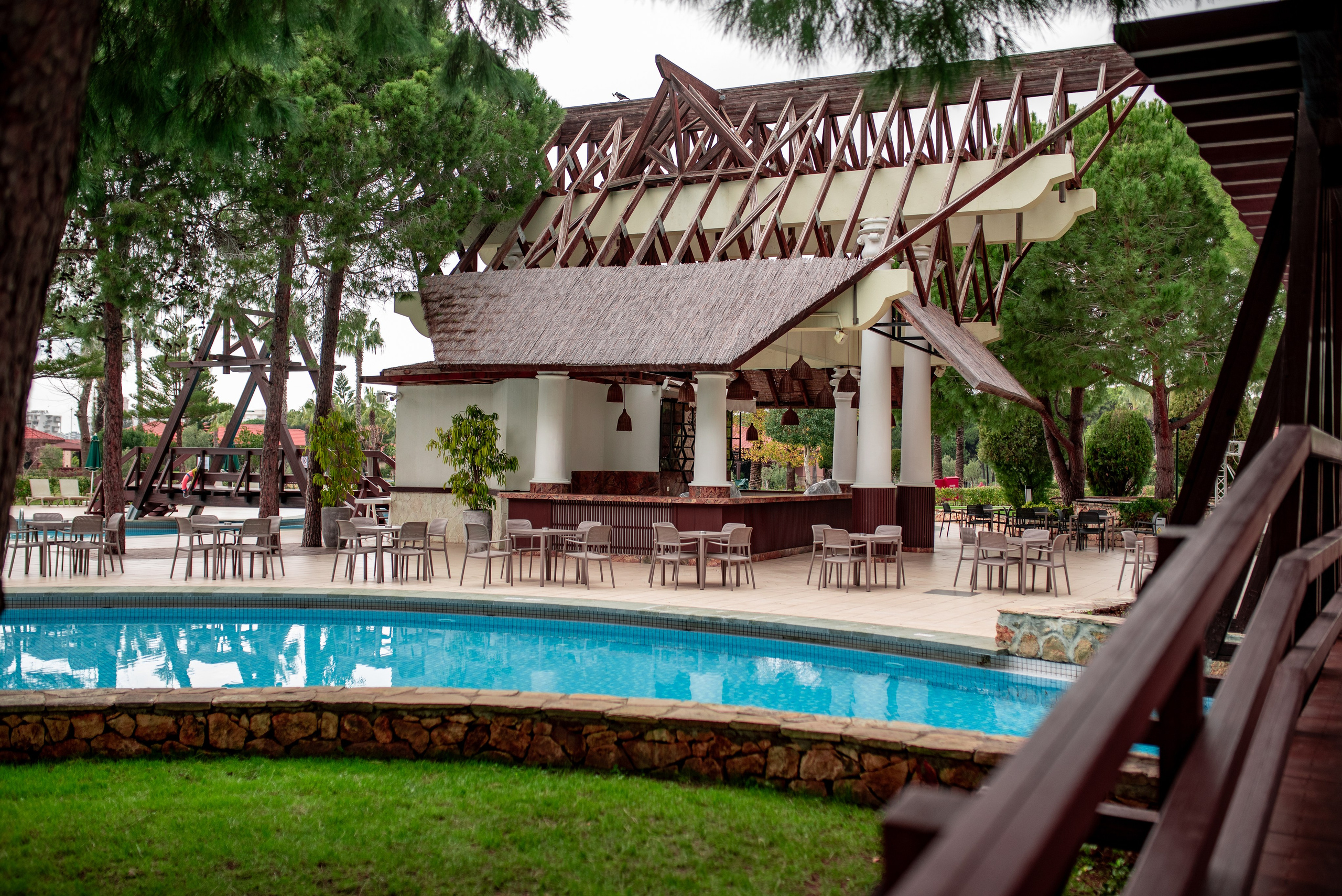 The atmosphere of the forest and pool of IC Hotels in Antalya, captured by a professional photographer.