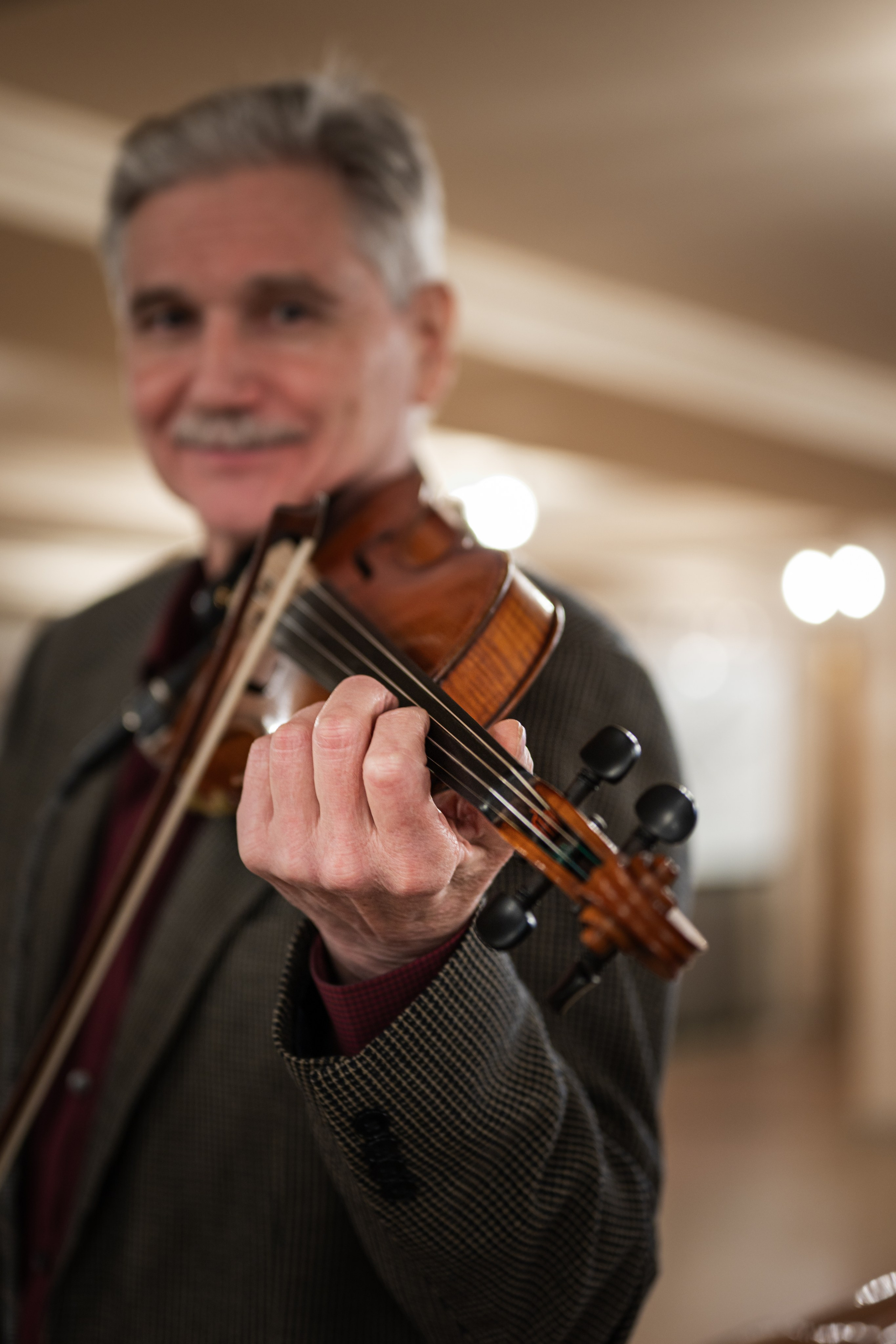 Violinist at Grand Central | NYC Portrait Session. Photography company in NYC — Sirius Proxima Photography