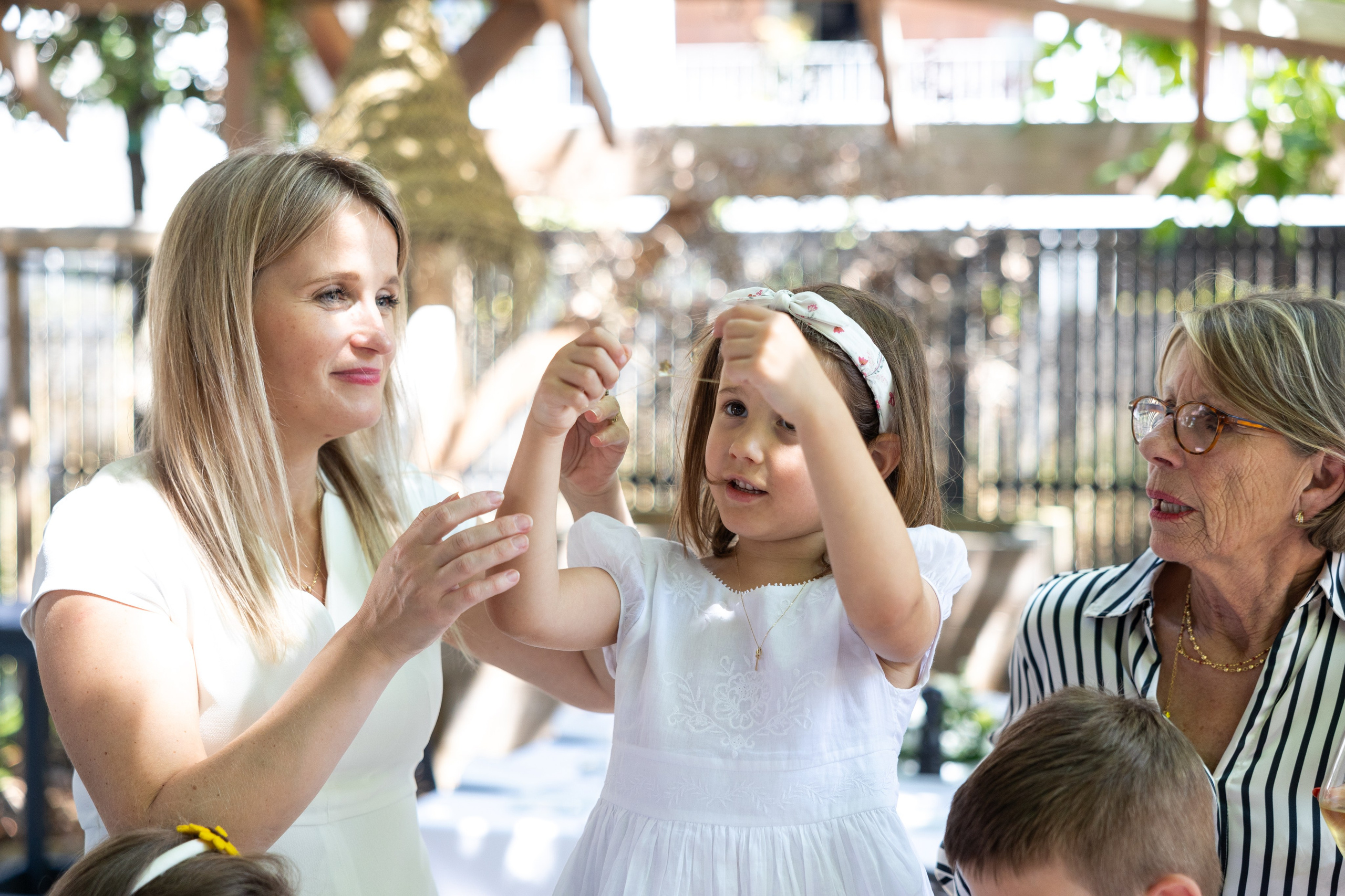 The Baptism of Diana in the Church of Saint-Sernin in Toulouse. Eugénie Smirnova — Photographe à Toulouse et dans le Sud-Ouest