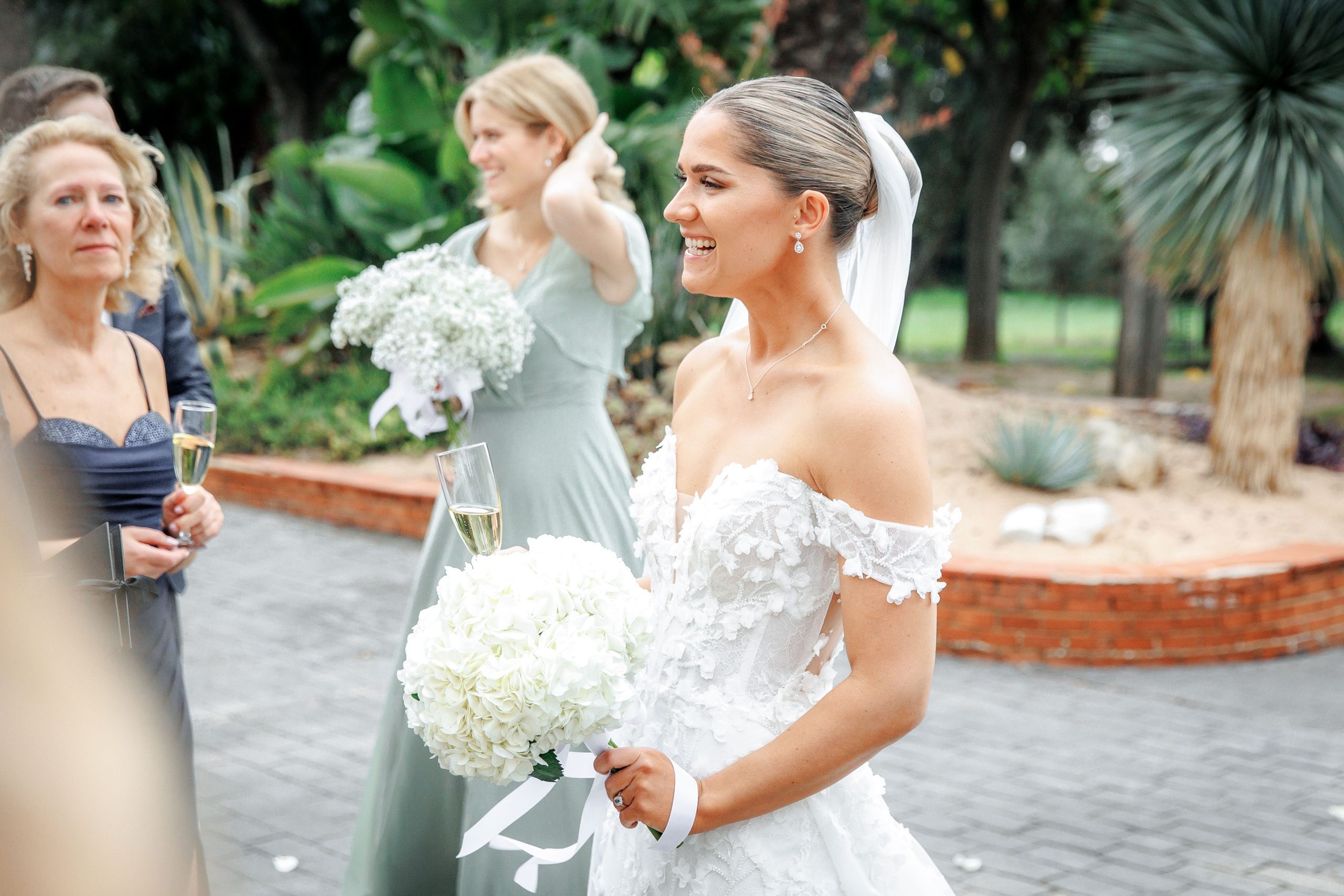 Emotional moment between the bride and her wedding guests during the ceremony in Barcelona, highlighting heartfelt connections.