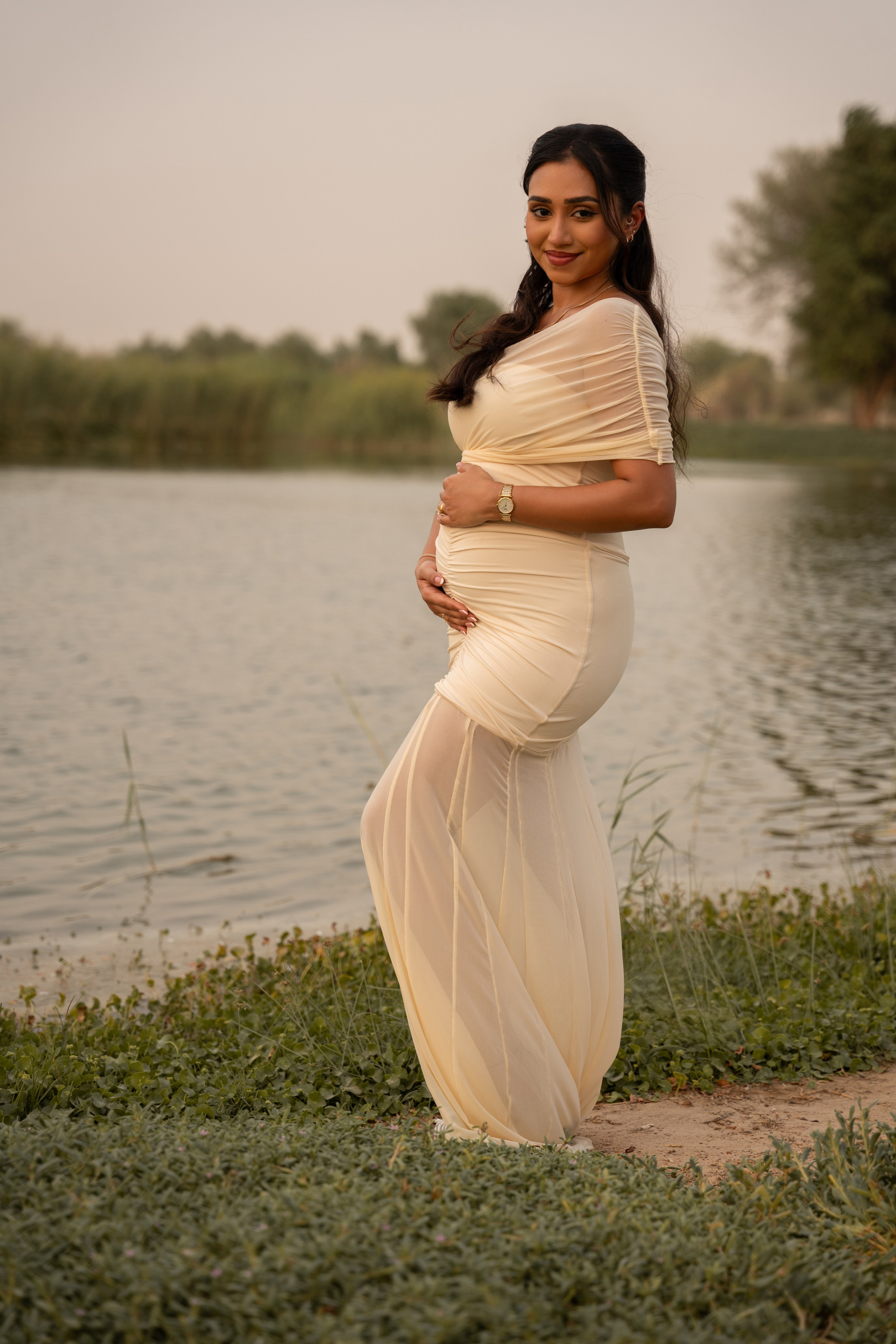 Sunset whispers: Boy or Girl?. Angela Iakovleva — Family Photographer in Dubai