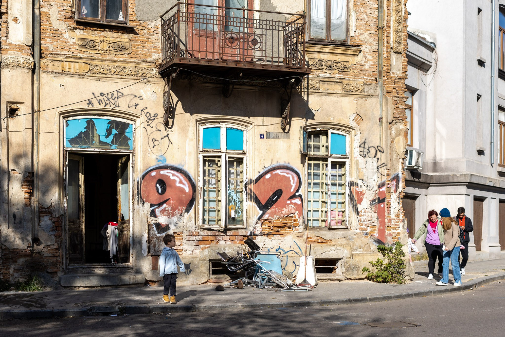 Color street. Humanistic street photographer in Bucharest