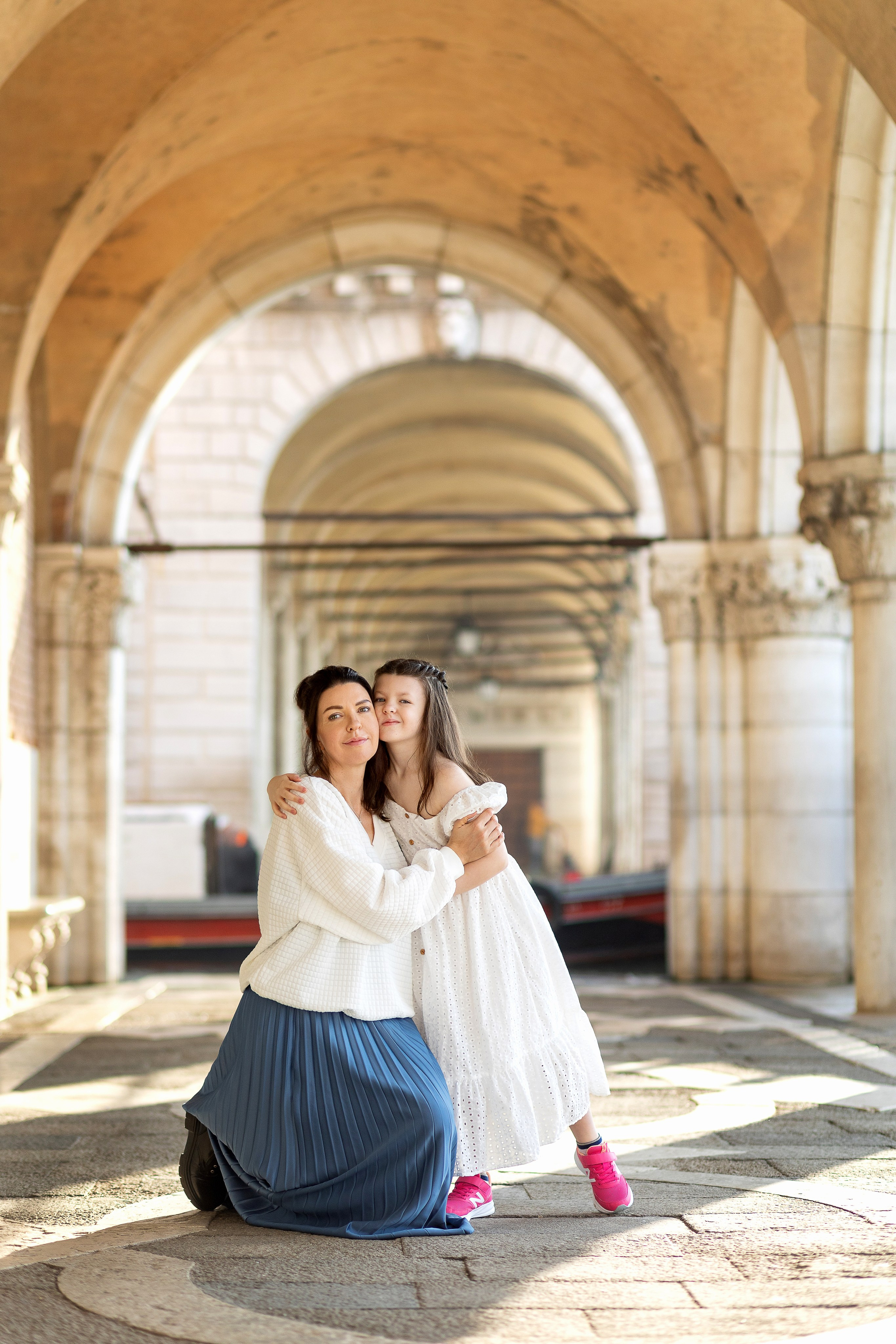 Mother and daughter at sunrise