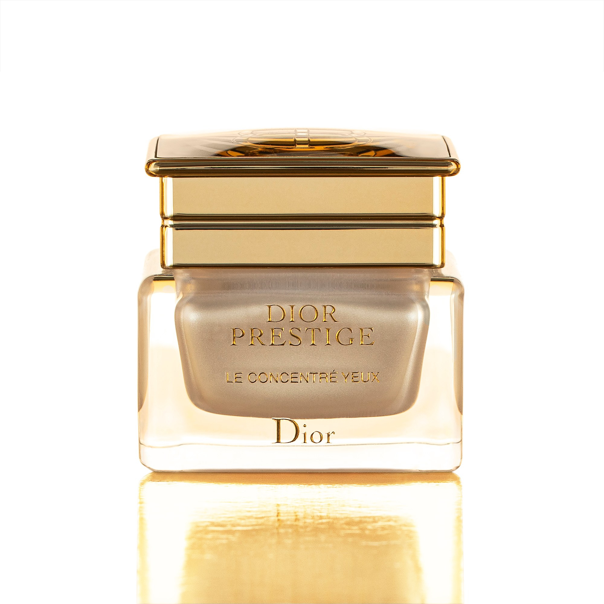 Photographer Roman Djuzev - Cream Dior Prestige photographed on a white background.