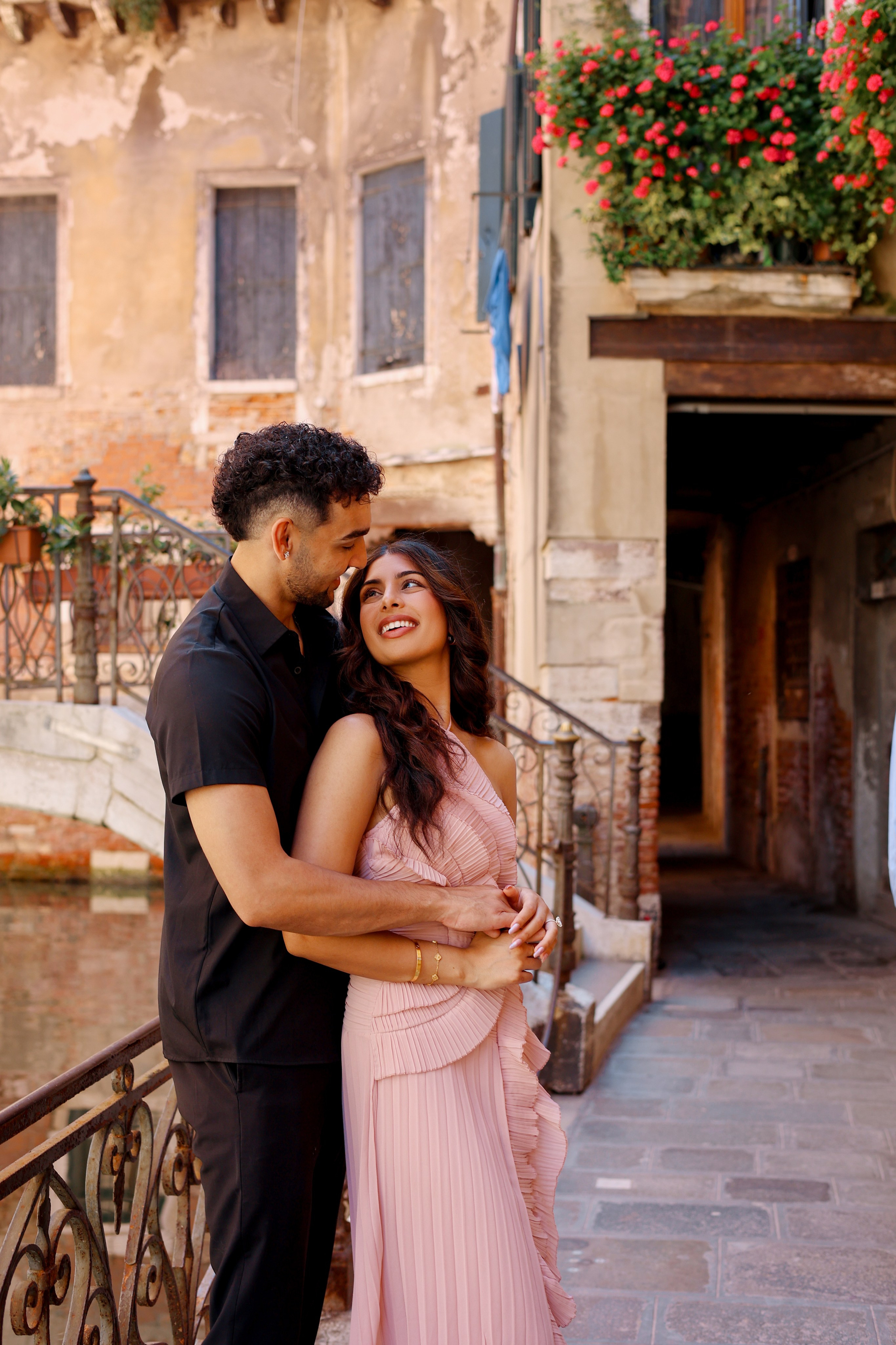 Proposal photographer capturing surprise engagement in Venice