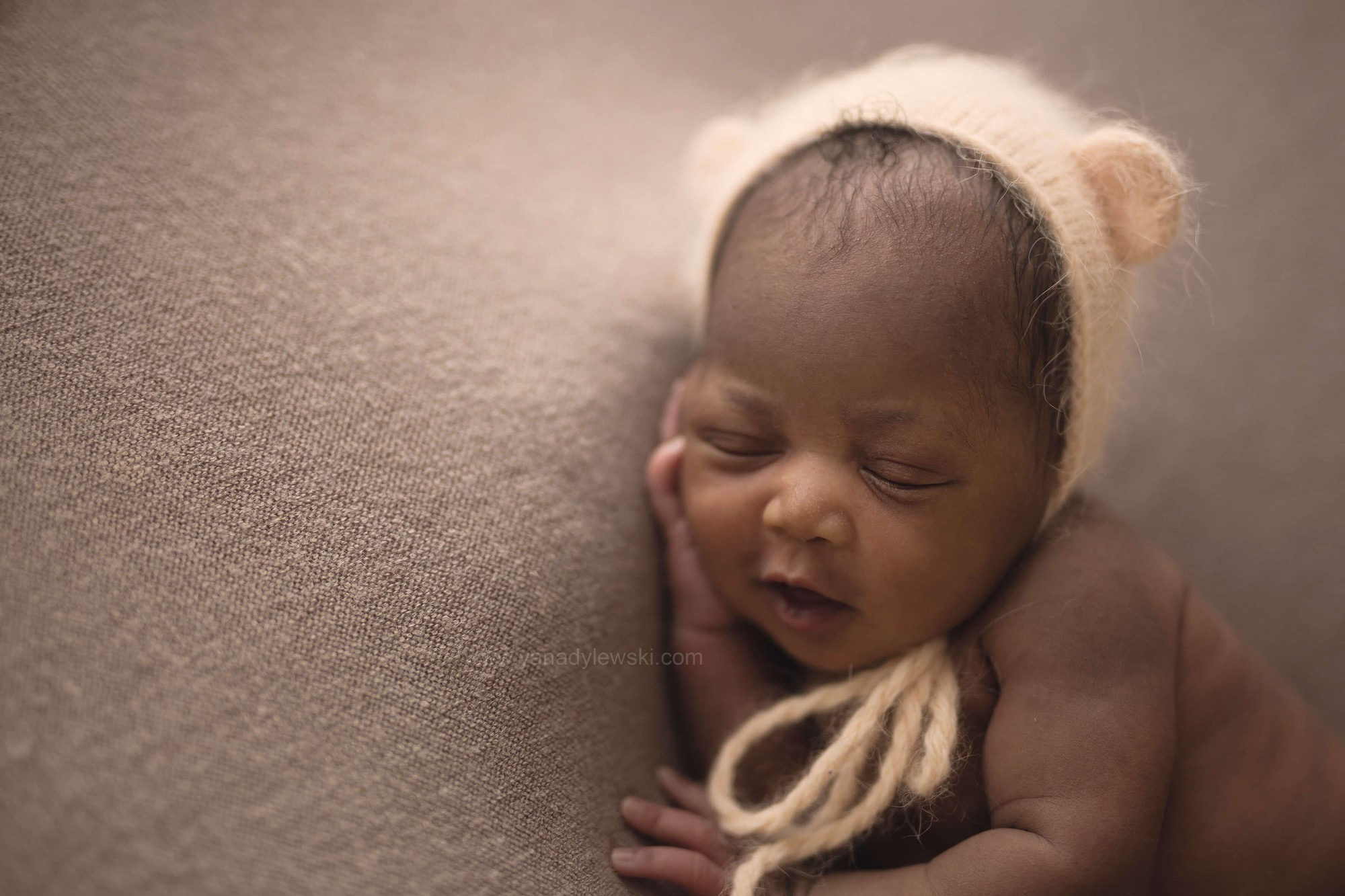 <photographe nouveaux nés Lille> 