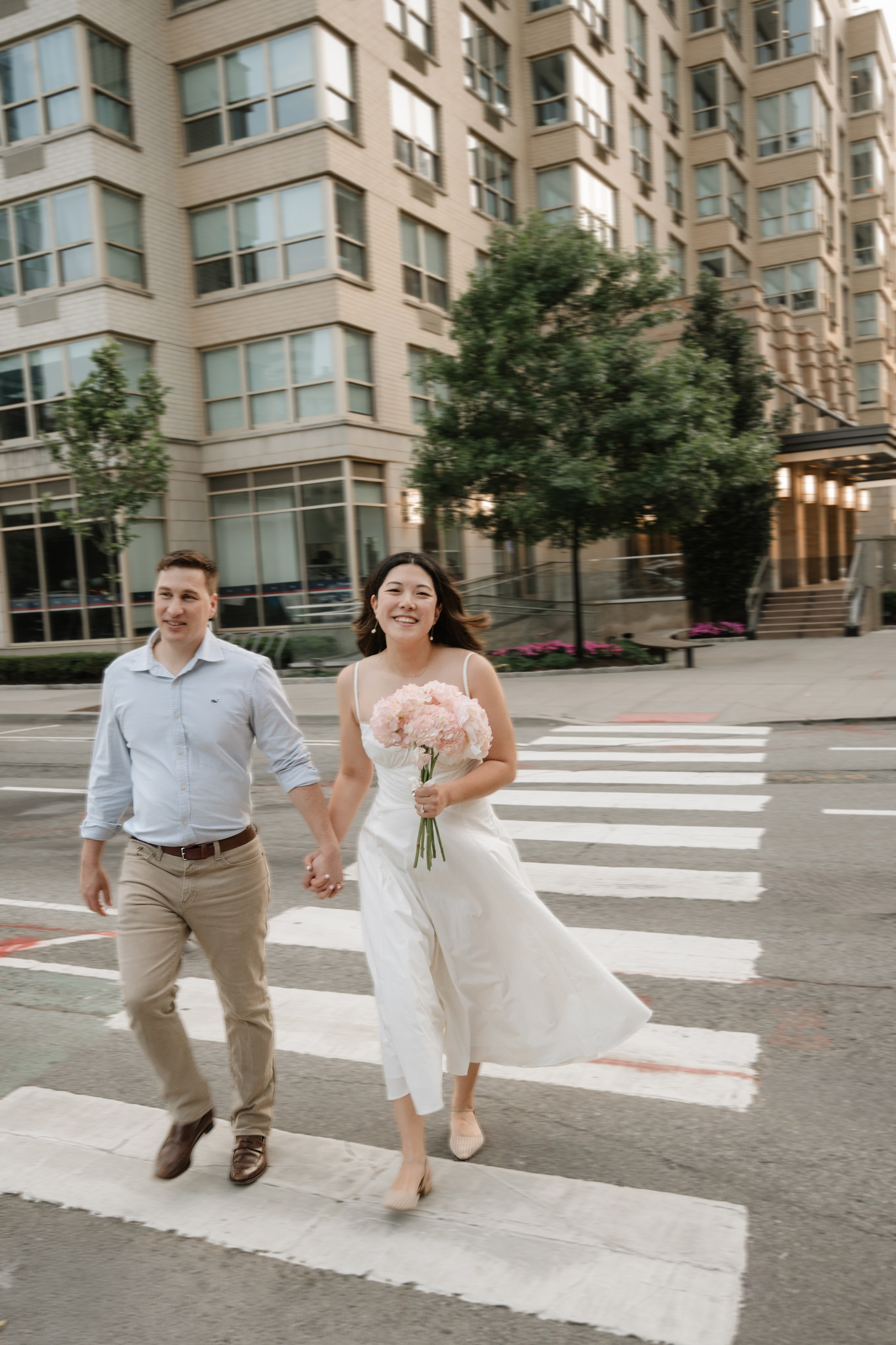 An adorable couple with their dog. Portrait and wedding photographer in New York