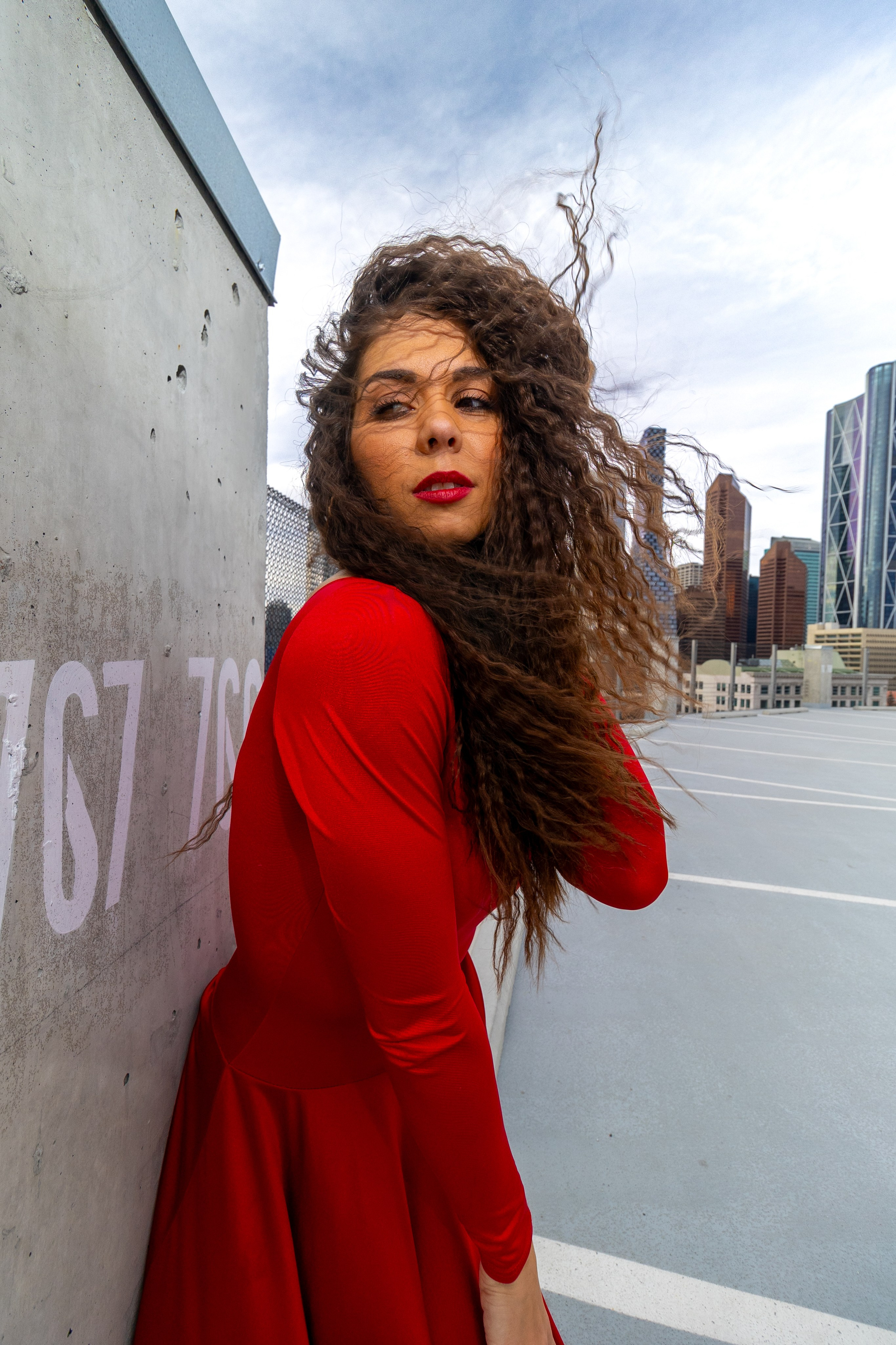 Radiant Elegance: Pamela’s Breathtaking Photoshoot in Red. ProFly.club — Professional aerial filming in Calgary