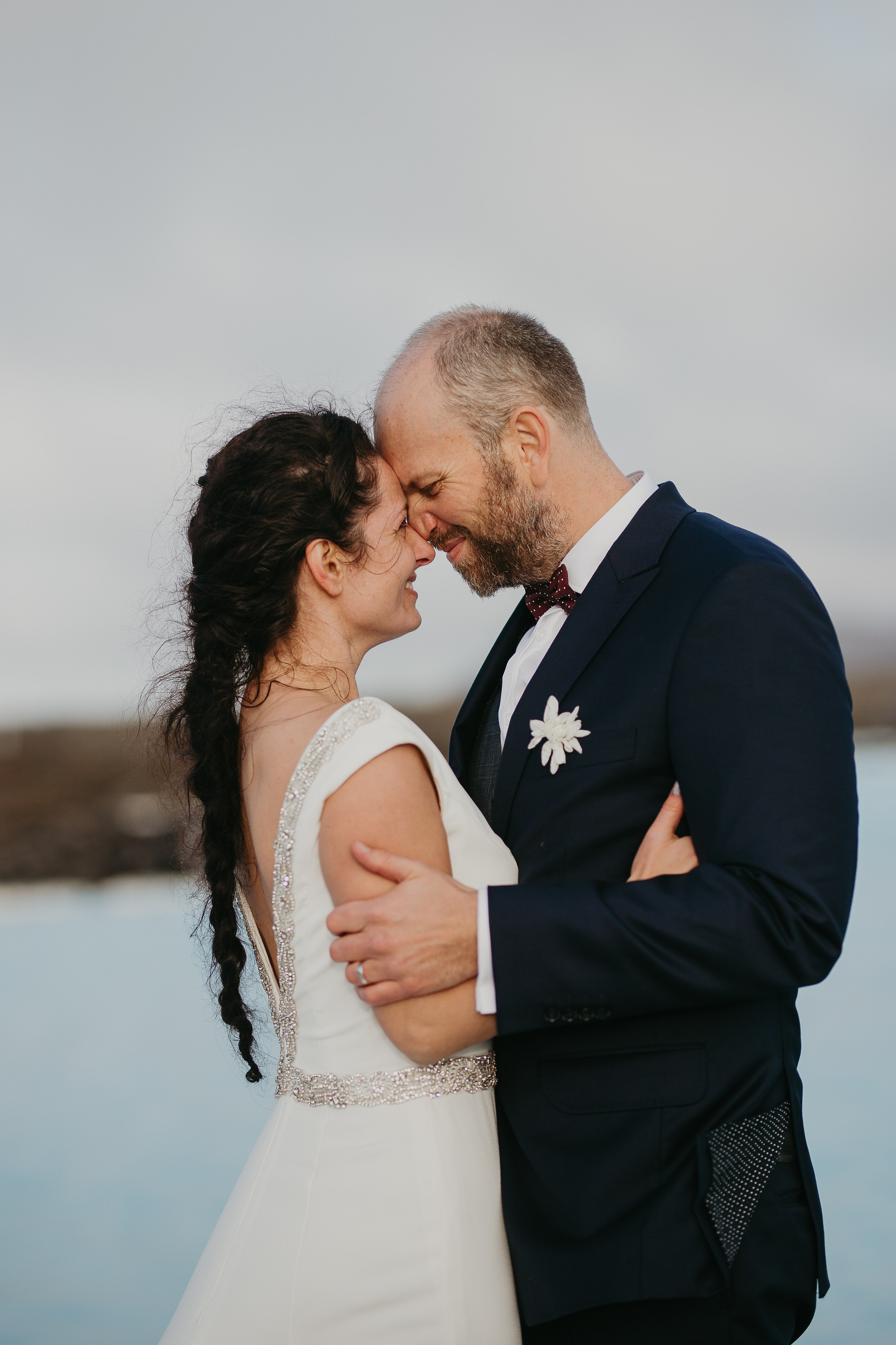 Candid couple’s moment in Iceland’s untamed wilderness, where love meets adventure