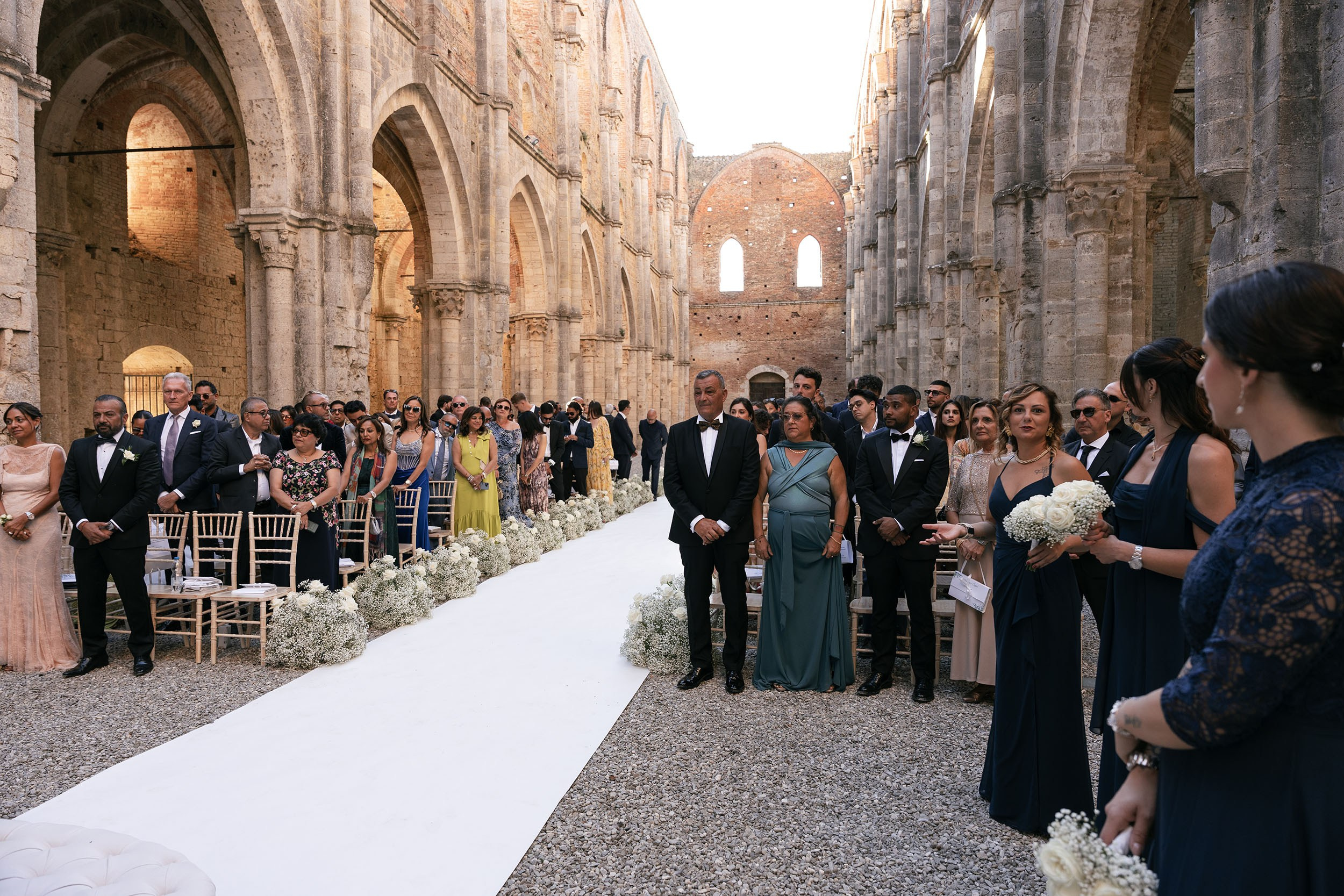 Ginevra and Avi — Abbazia di San Galgano, Tuscany. Destination Wedding Photographers and content creators based in Spain