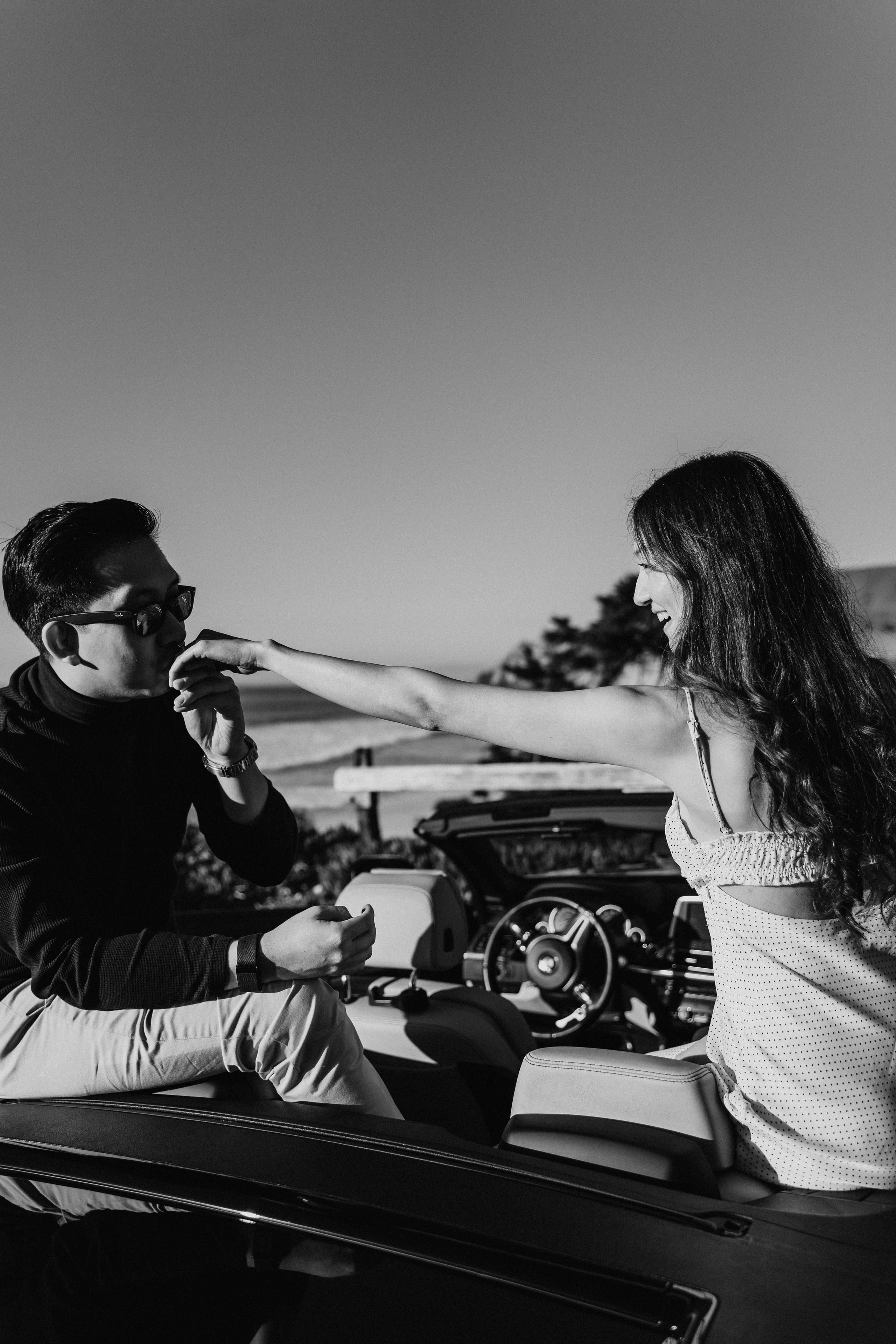 A photo shoot on the San Francisco beach at sunset. Engagement session. 