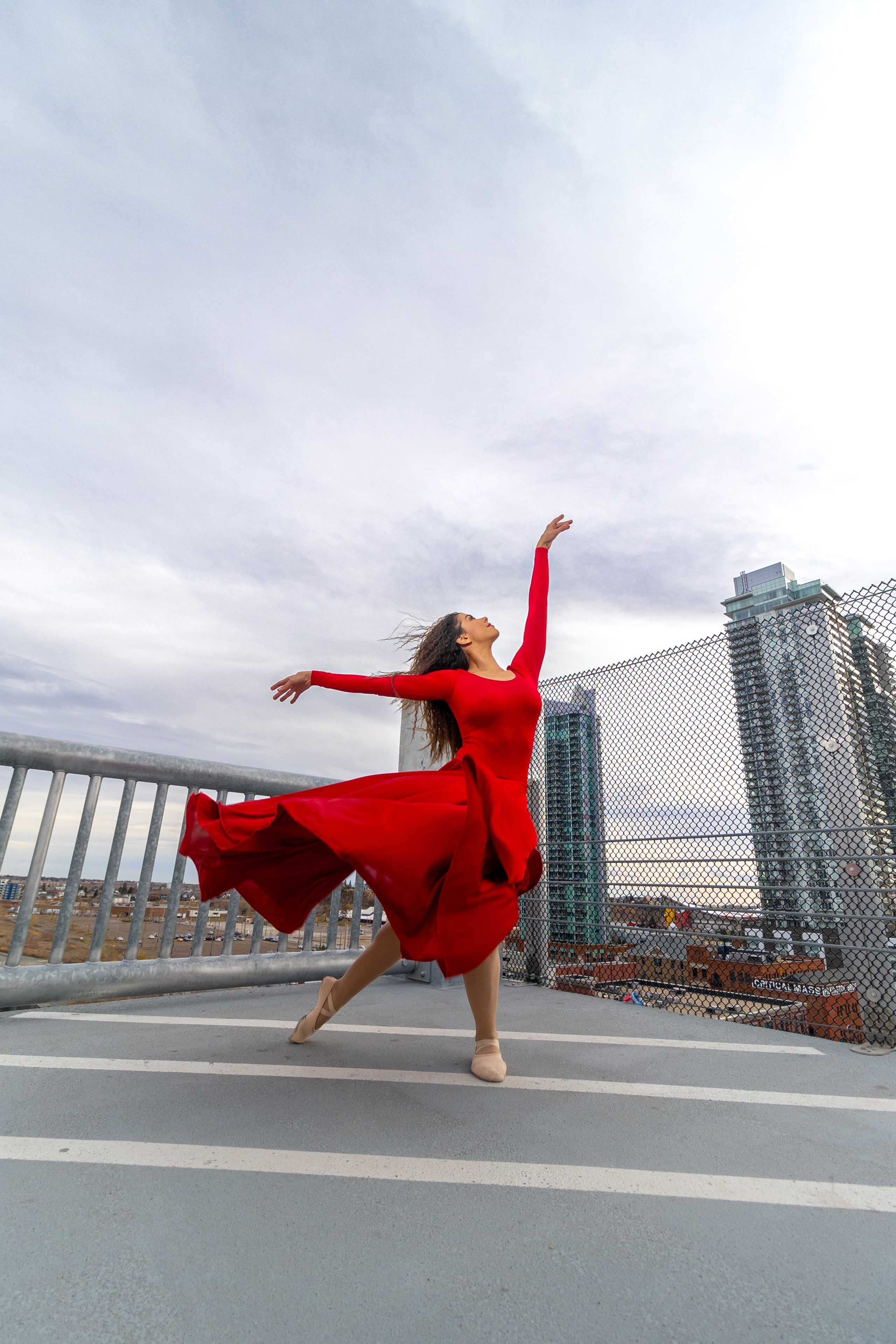 Radiant Elegance: Pamela’s Breathtaking Photoshoot in Red. ProFly.club — Professional aerial filming in Calgary