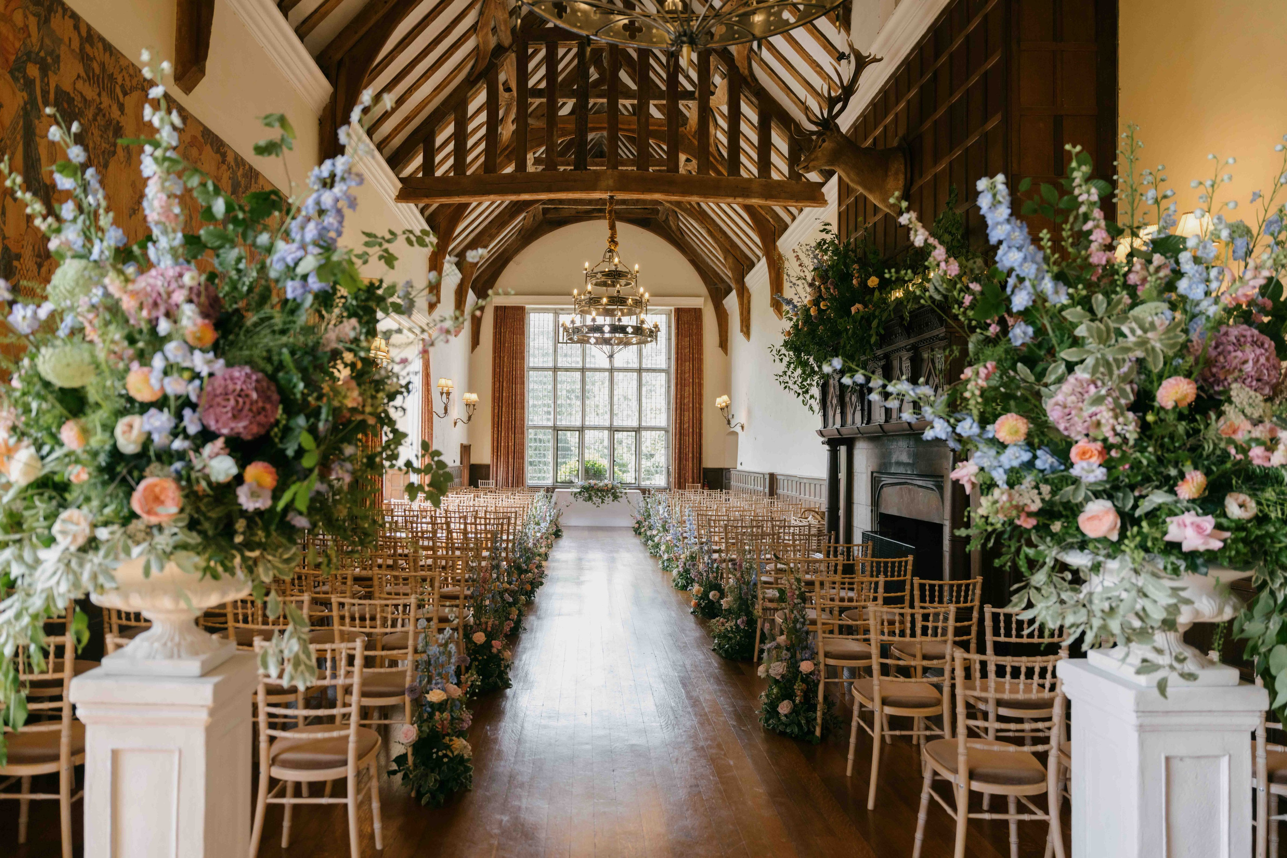     floral wedding ceremony decor Layer Marney Tower Essex