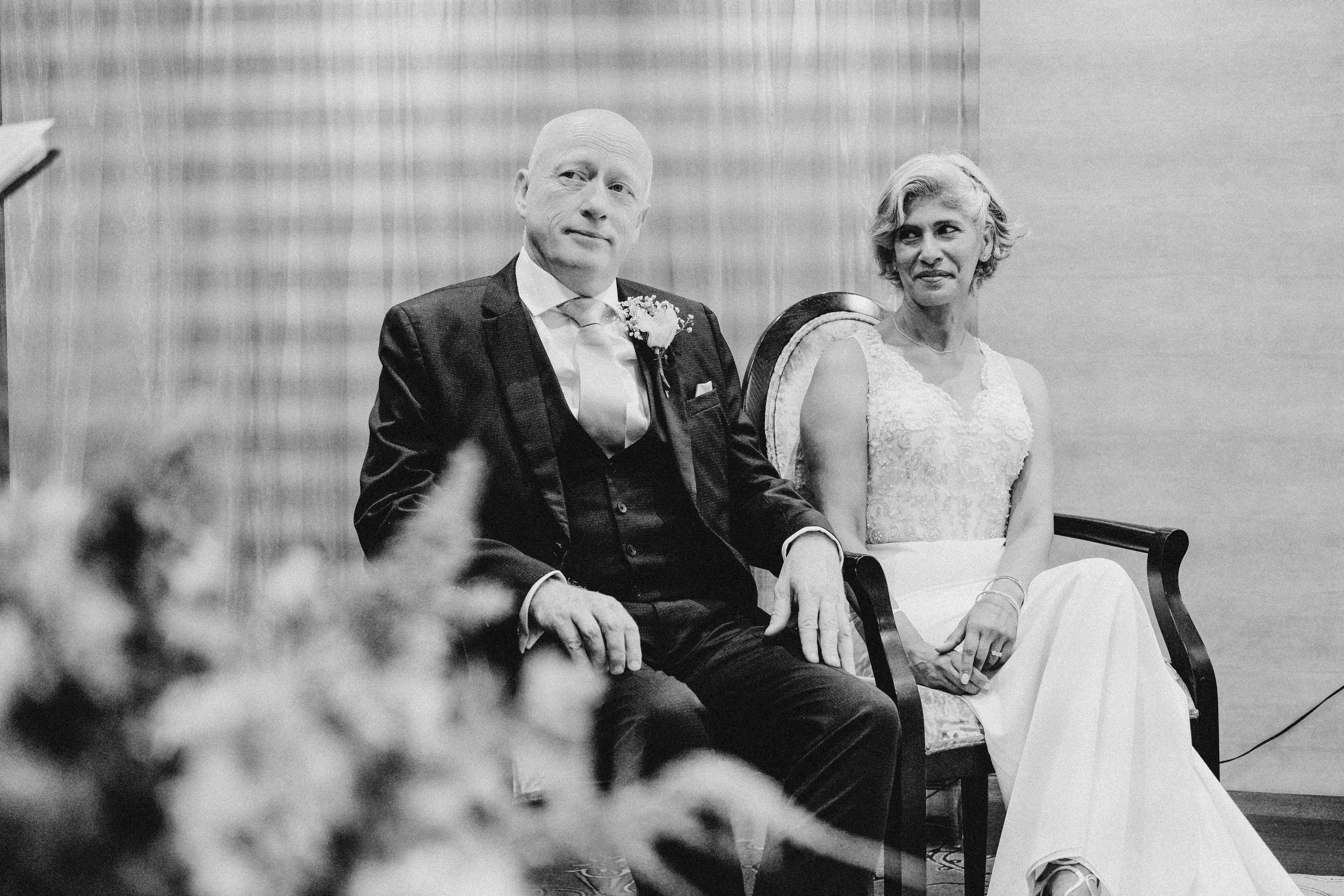 Bride wiping away a tear during her Solihull wedding ceremony