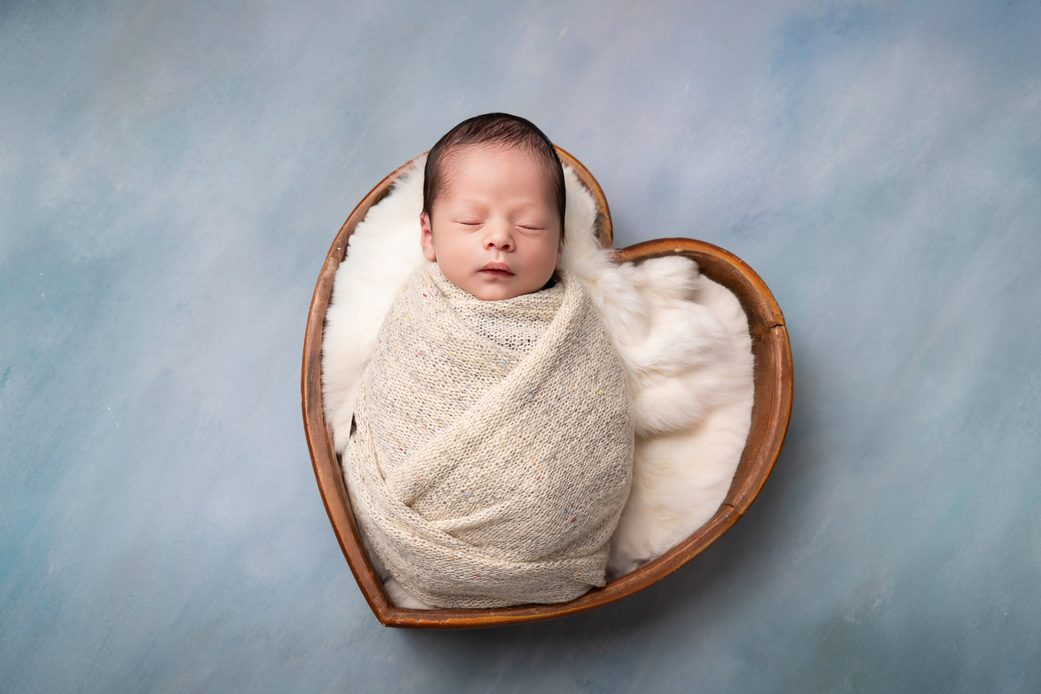 Angel Newborn Photoshoot. Professional family, maternity & newborn photographer in North Charleston, SC, creating timeless portraits