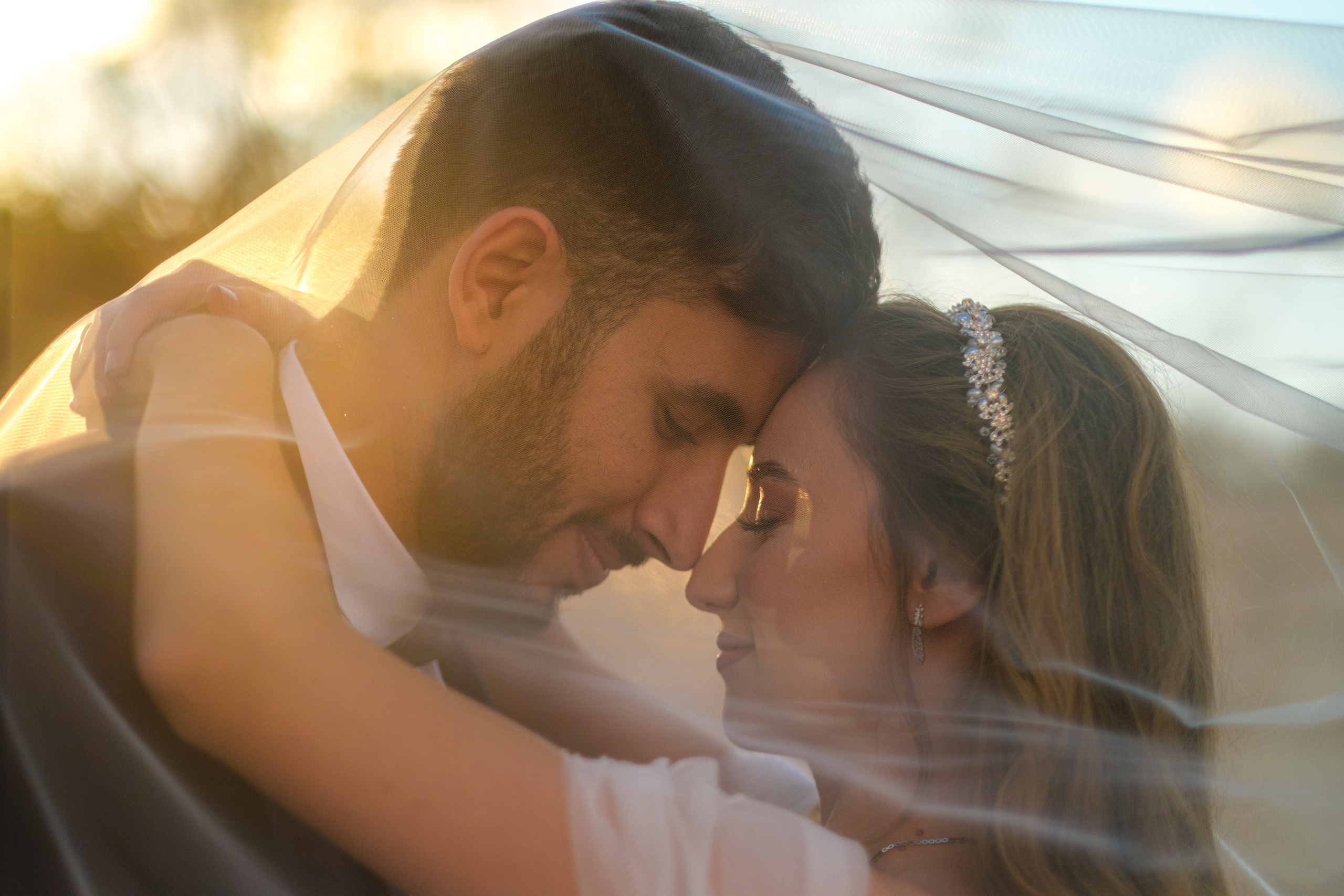 Love Story , wedding Romantic wedding couple portrait, bride with veil and groom in suit, emotional wedding photography by Maxim Polak Israel