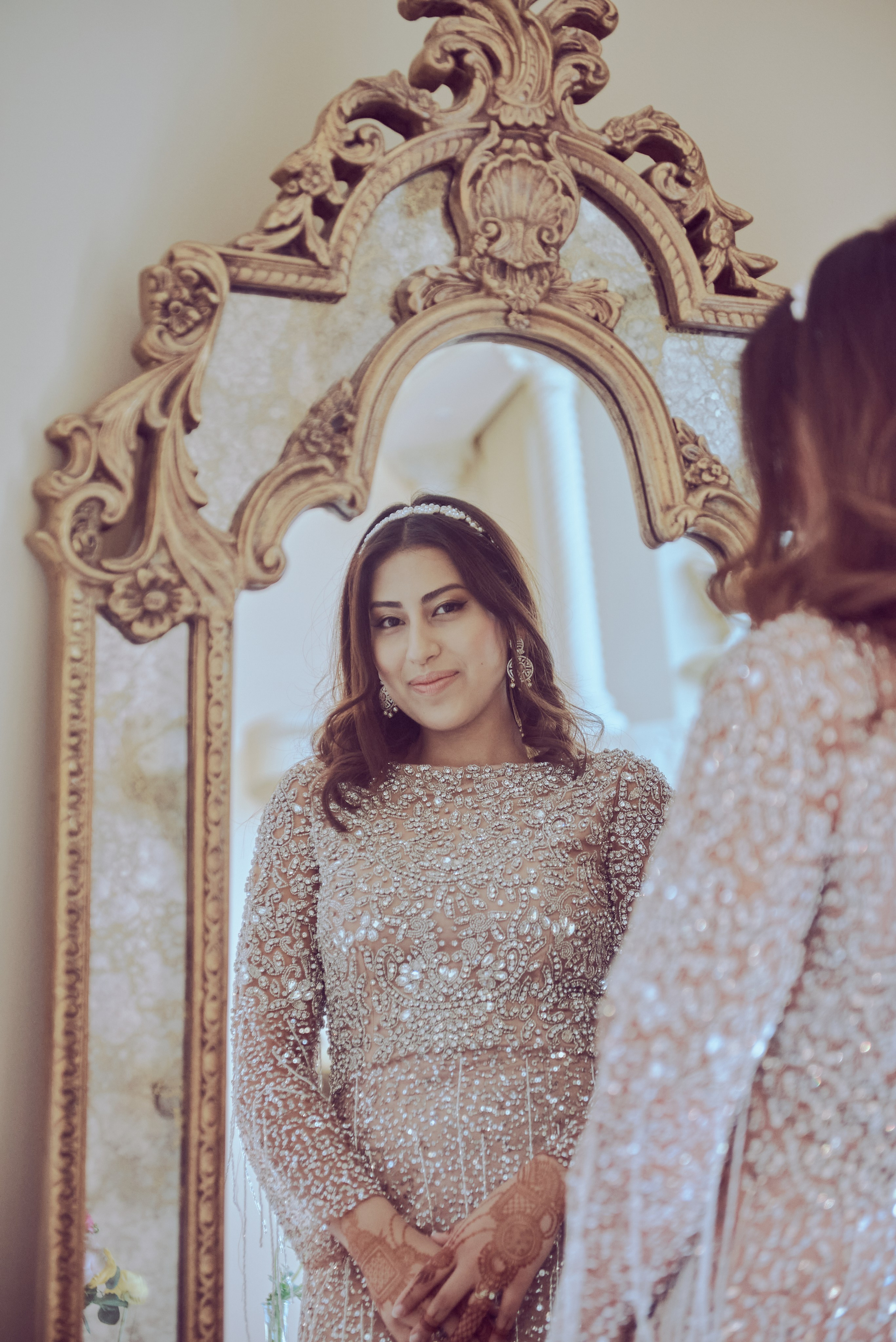 Playful engagement photo of a couple enjoying a fun moment in downtown Los Angeles