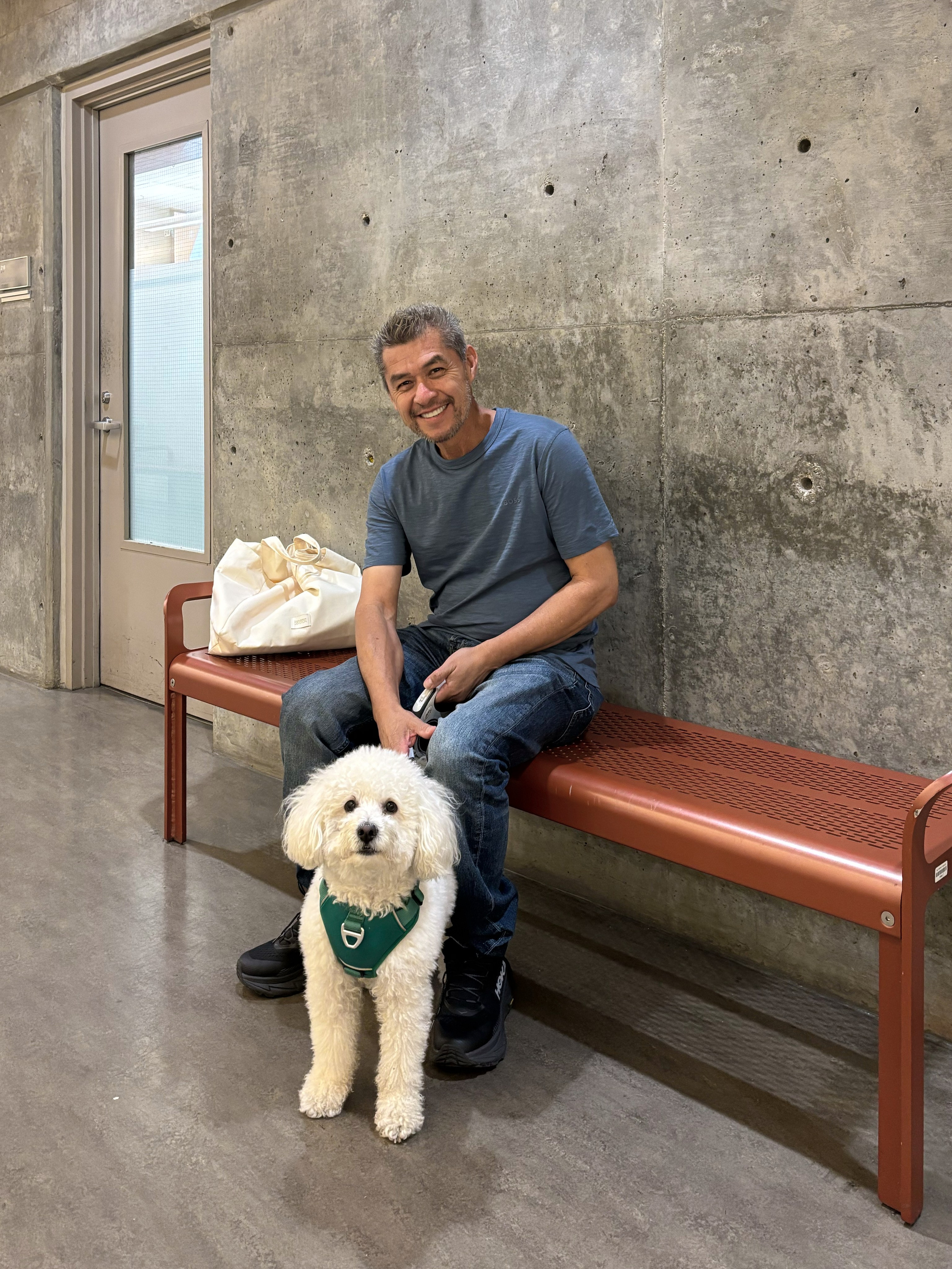Elegant outdoor portrait of a man and his dog photographed near the California coastline