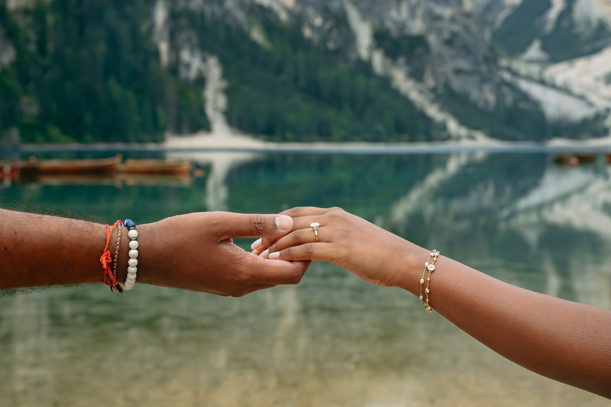Engagement ring revealed during a sunrise proposal in the Italian Alps.