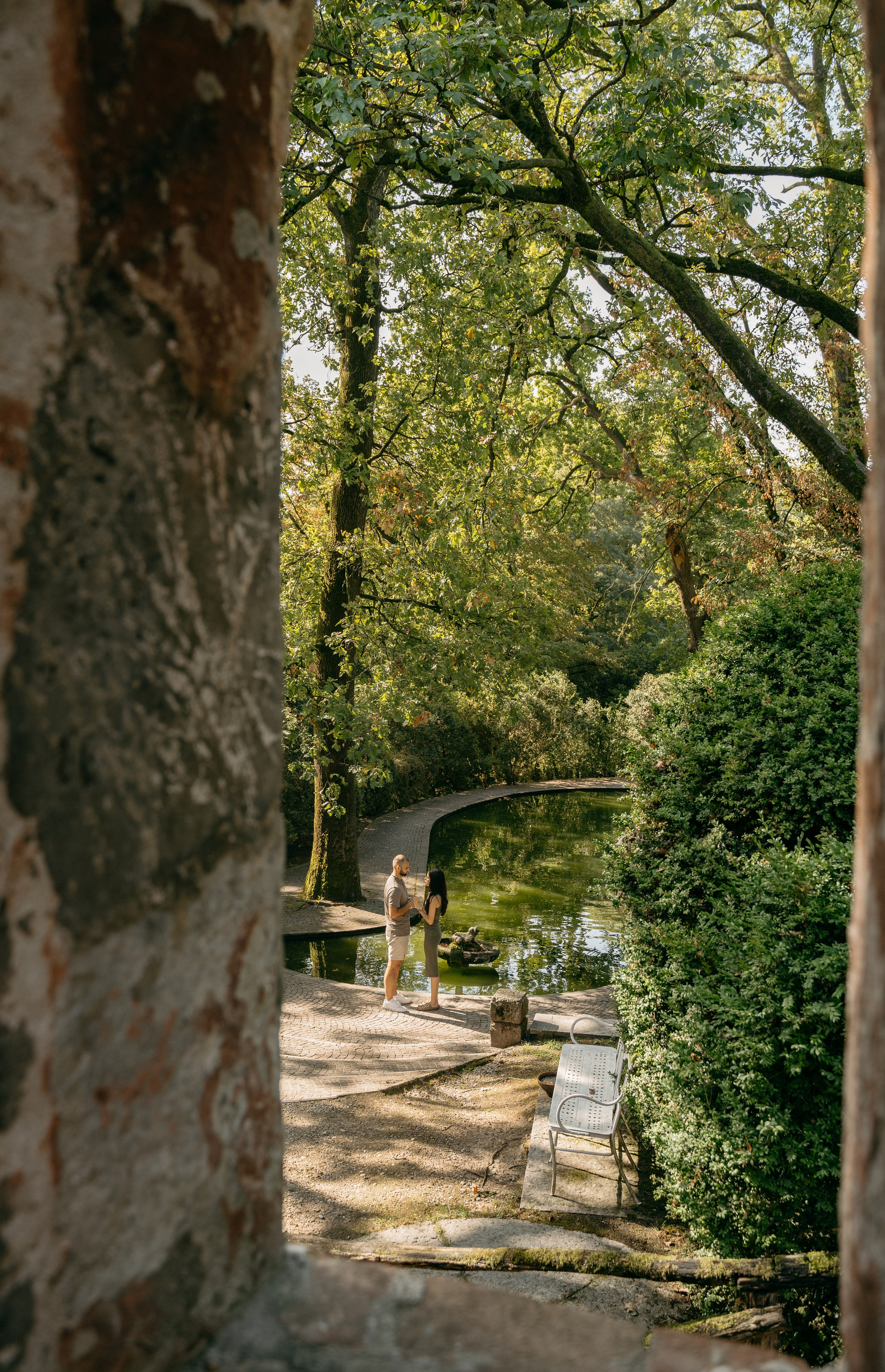 Romantic engagement photography session in the gardens of Parco Sigurtà near Lake Garda.