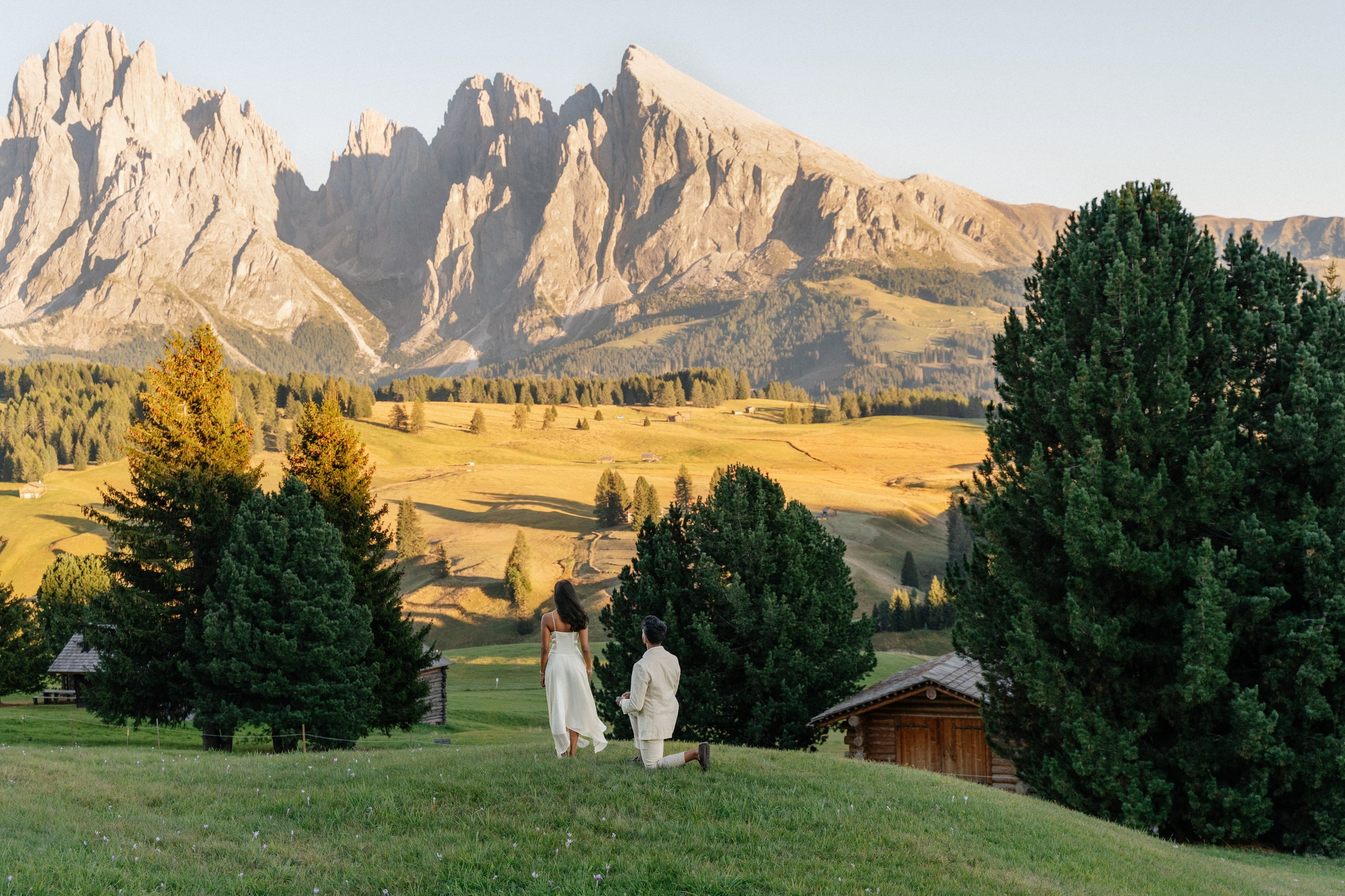A surprise marriage proposal surrounded by the mountain scenery of Alpe di Siusi.