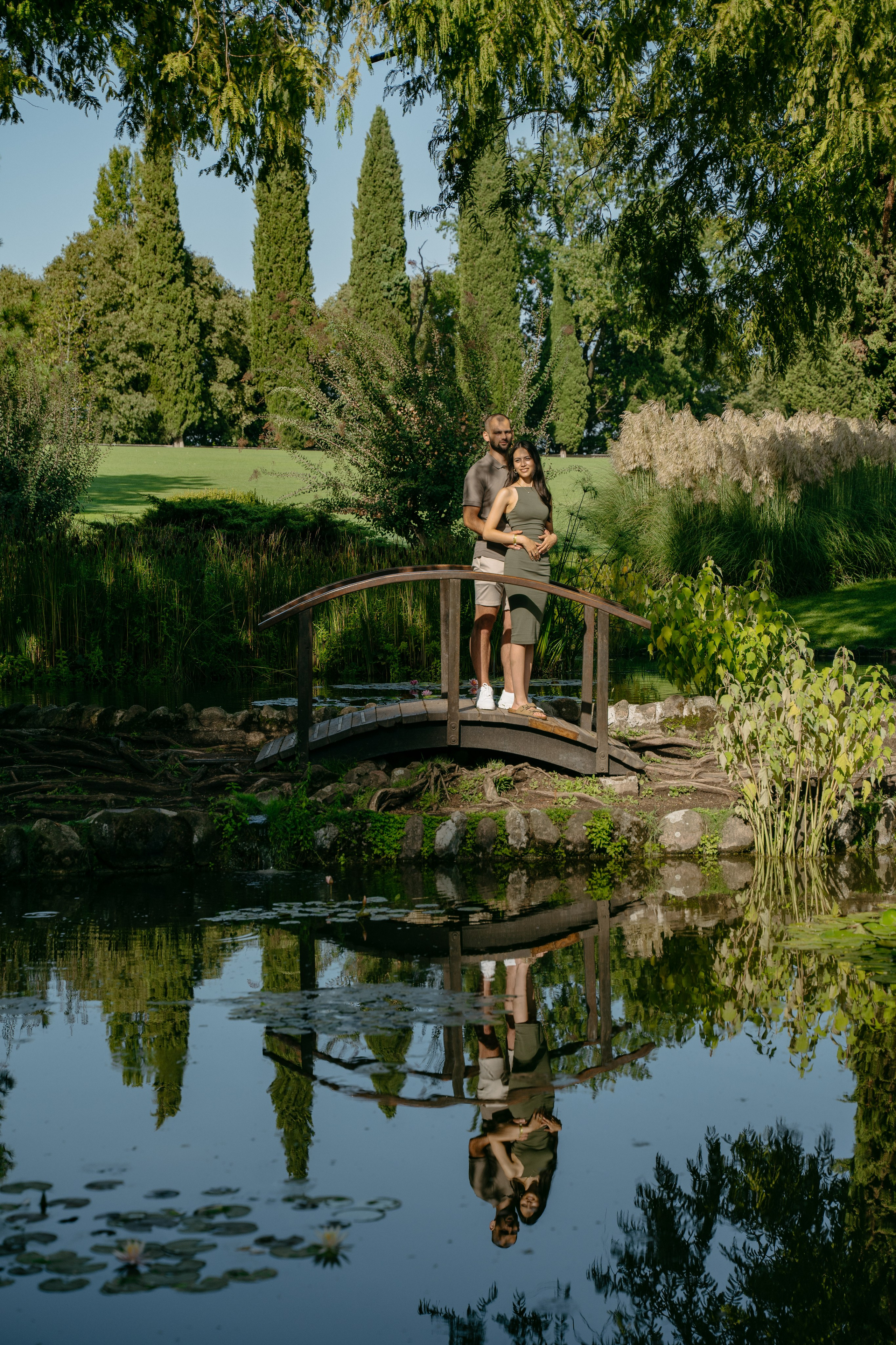 Romantic portrait of a newly engaged couple surrounded by the natural beauty of Parco Giardino Sigurtà.