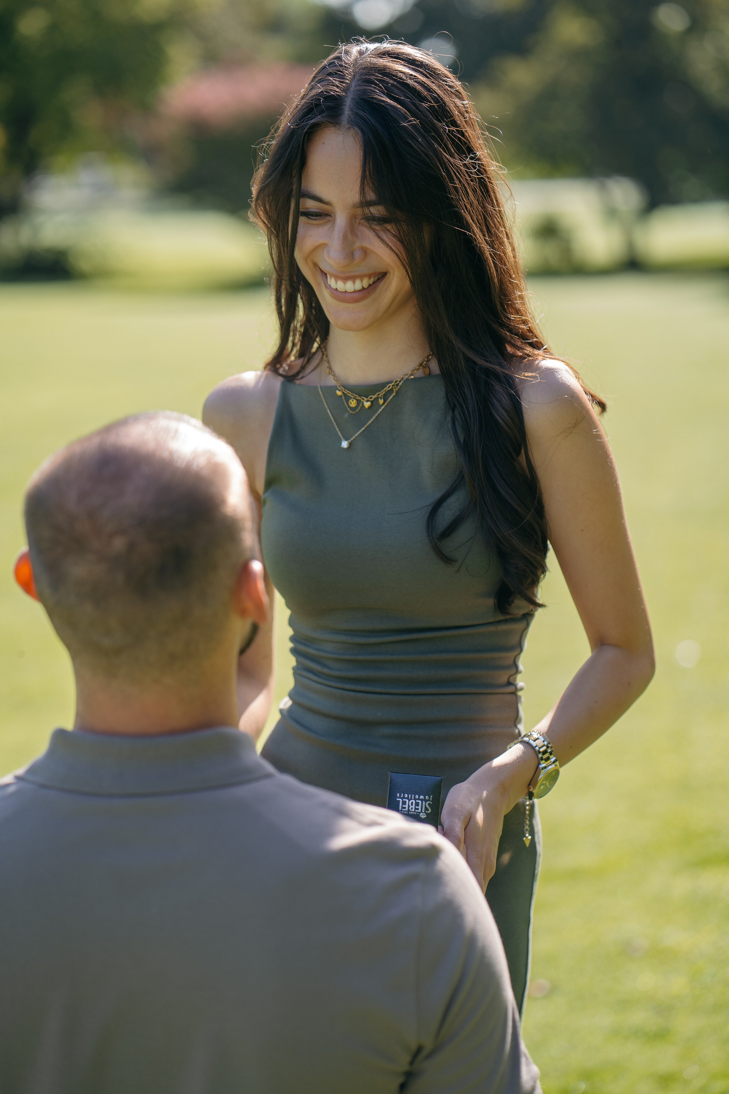 Emotional moment as she says yes during a surprise proposal at Parco Sigurtà in Verona.