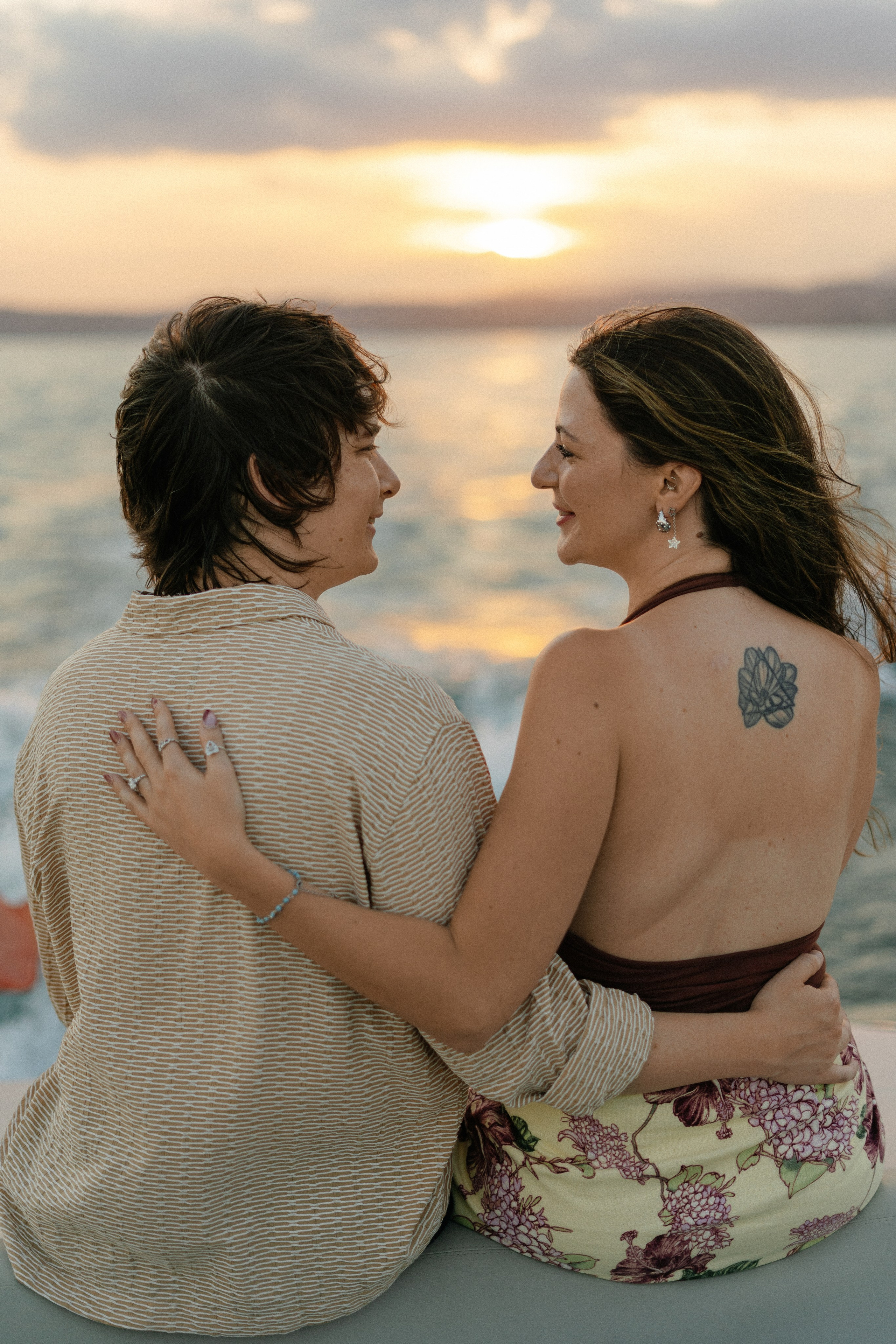 Elegant Sirmione marriage proposal photographed aboard a luxury boat on Lake Garda.