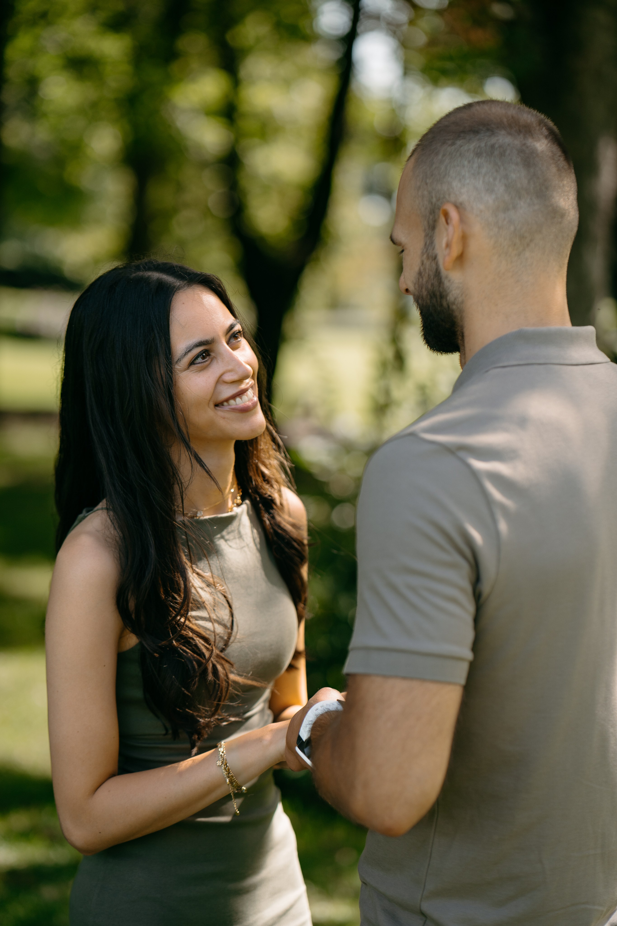 Candid reaction during an intimate outdoor proposal at Parco Sigurtà in Verona, Italy.