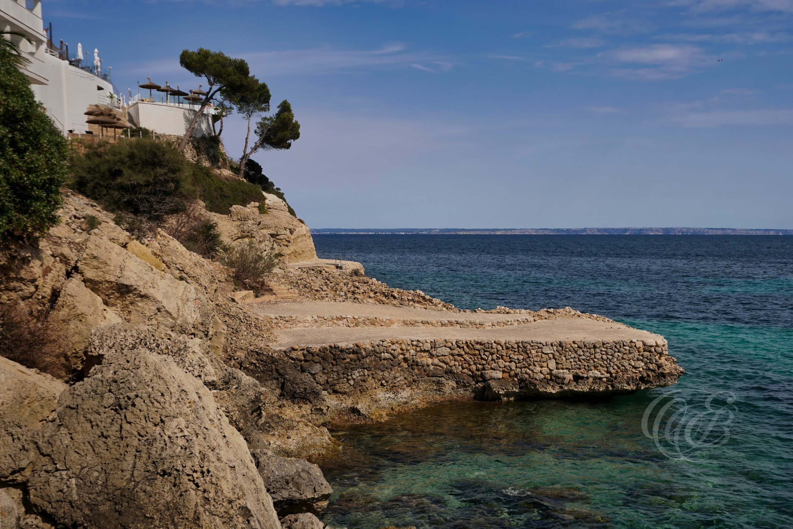 The Torrenova cliffs form part of the rocky coastline between Magaluf and Palmanova on Mallorca’s southwestern shore. Shaped by the natural forces of the Mediterranean over time, these coastal formations contrast with the nearby urban and tourist areas, revealing another aspect of the island’s diverse landscape. This photograph emphasizes the textures, forms, and natural character that define this section of Mallorca’s coastline.