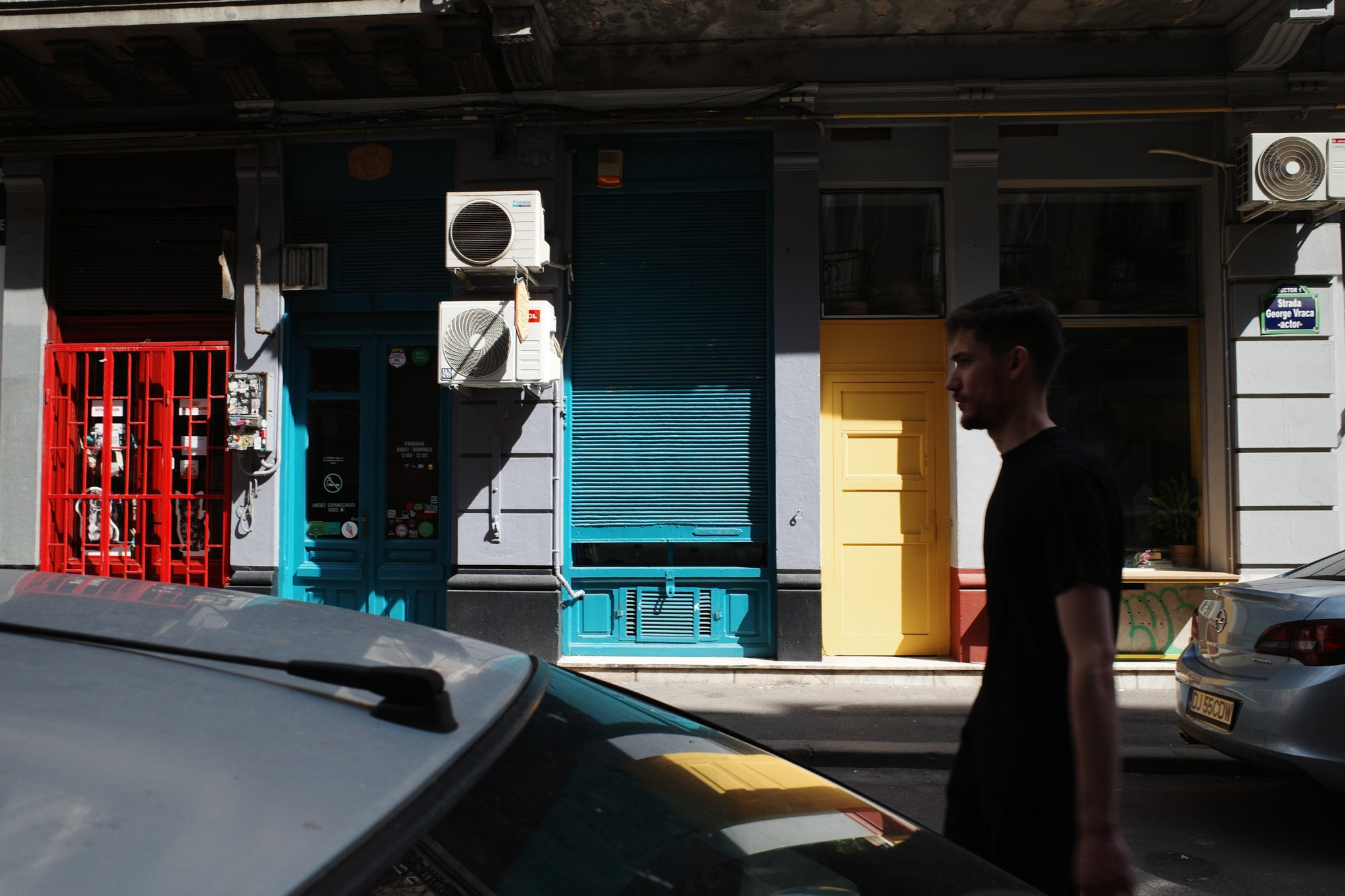 Color street. Humanistic street photographer in Bucharest