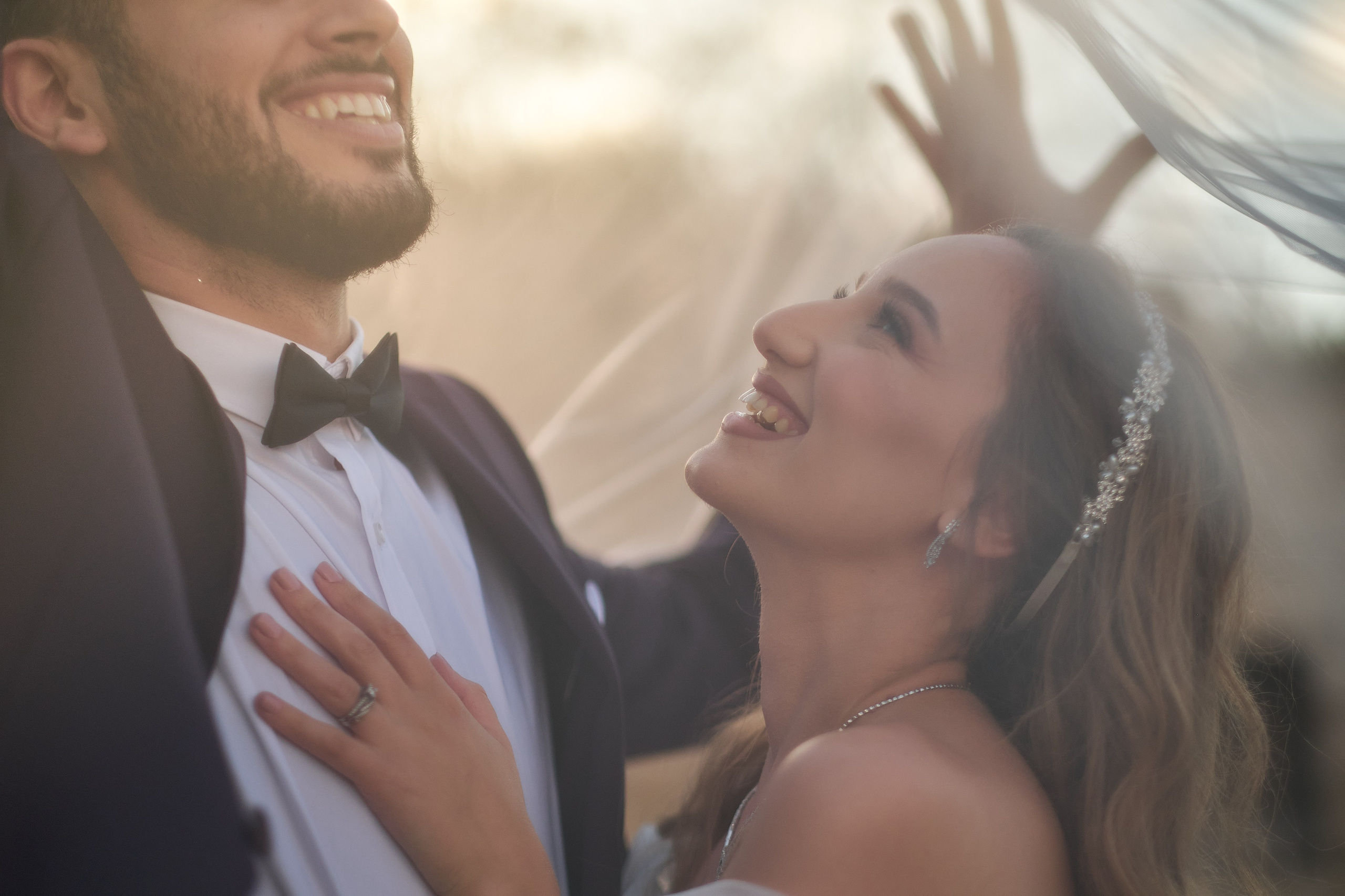 Love Story , wedding Romantic wedding couple portrait, bride with veil and groom in suit, emotional wedding photography by Maxim Polak Israel
