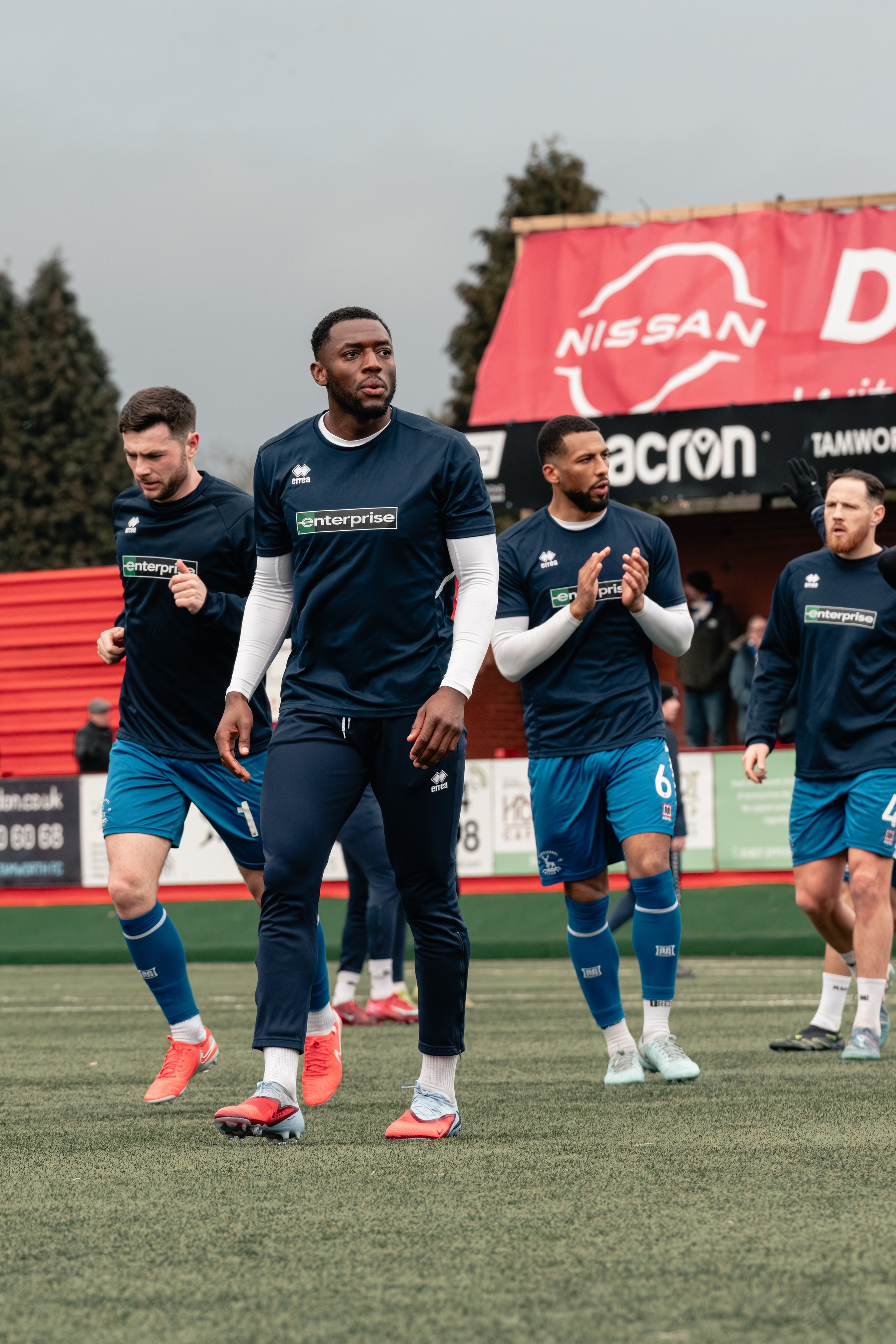 Hartlepool United players walk out for their pre-match warm-up at The Lamb Ground.