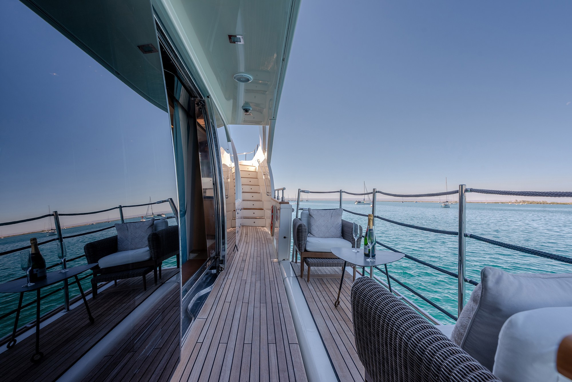 Luxury yacht deck walkway with ocean view photographed for yacht and real estate photography in Cabos Area