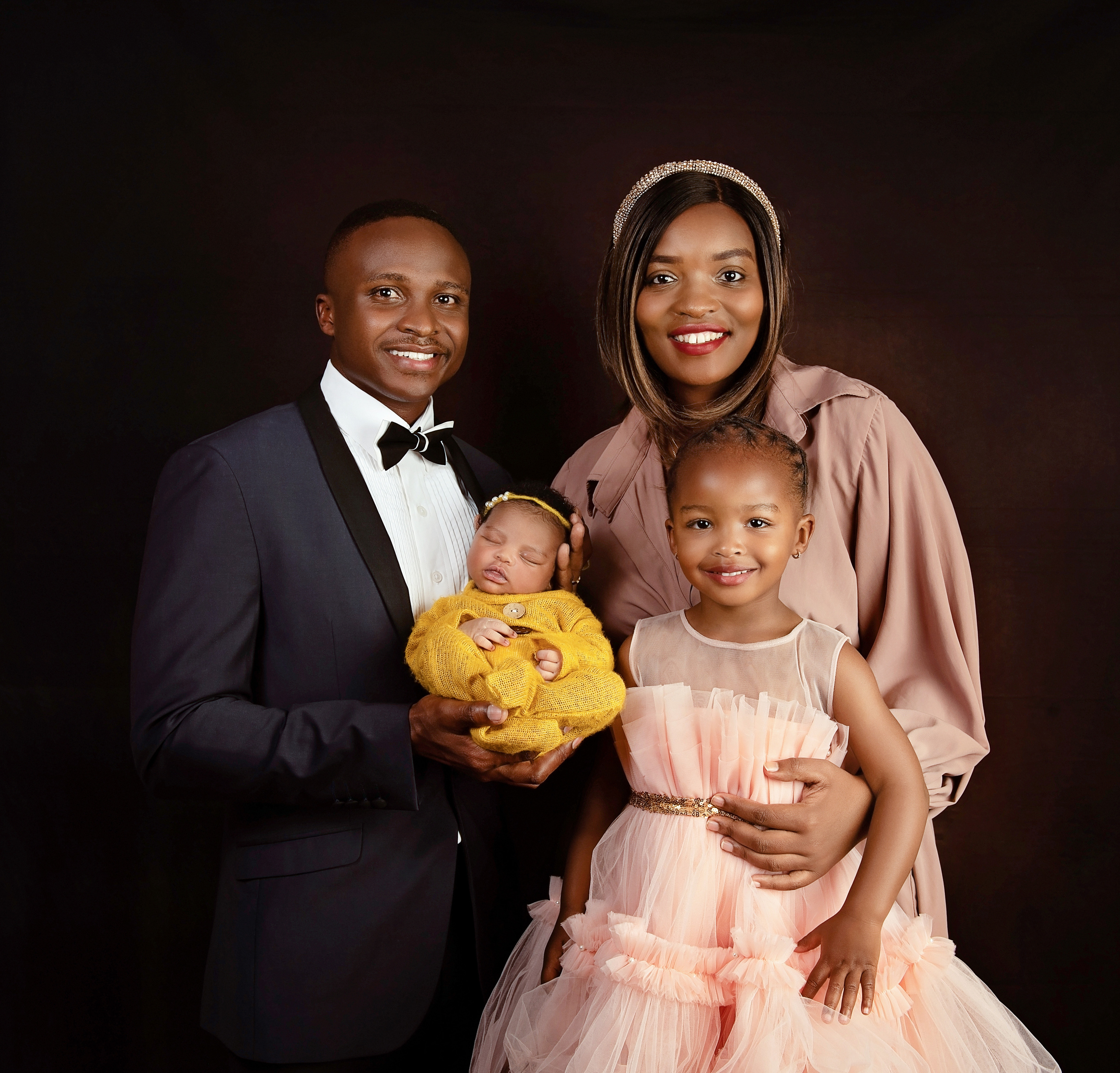 Beautiful black family mother father sister 8 days newborn Nairobi Kenya 