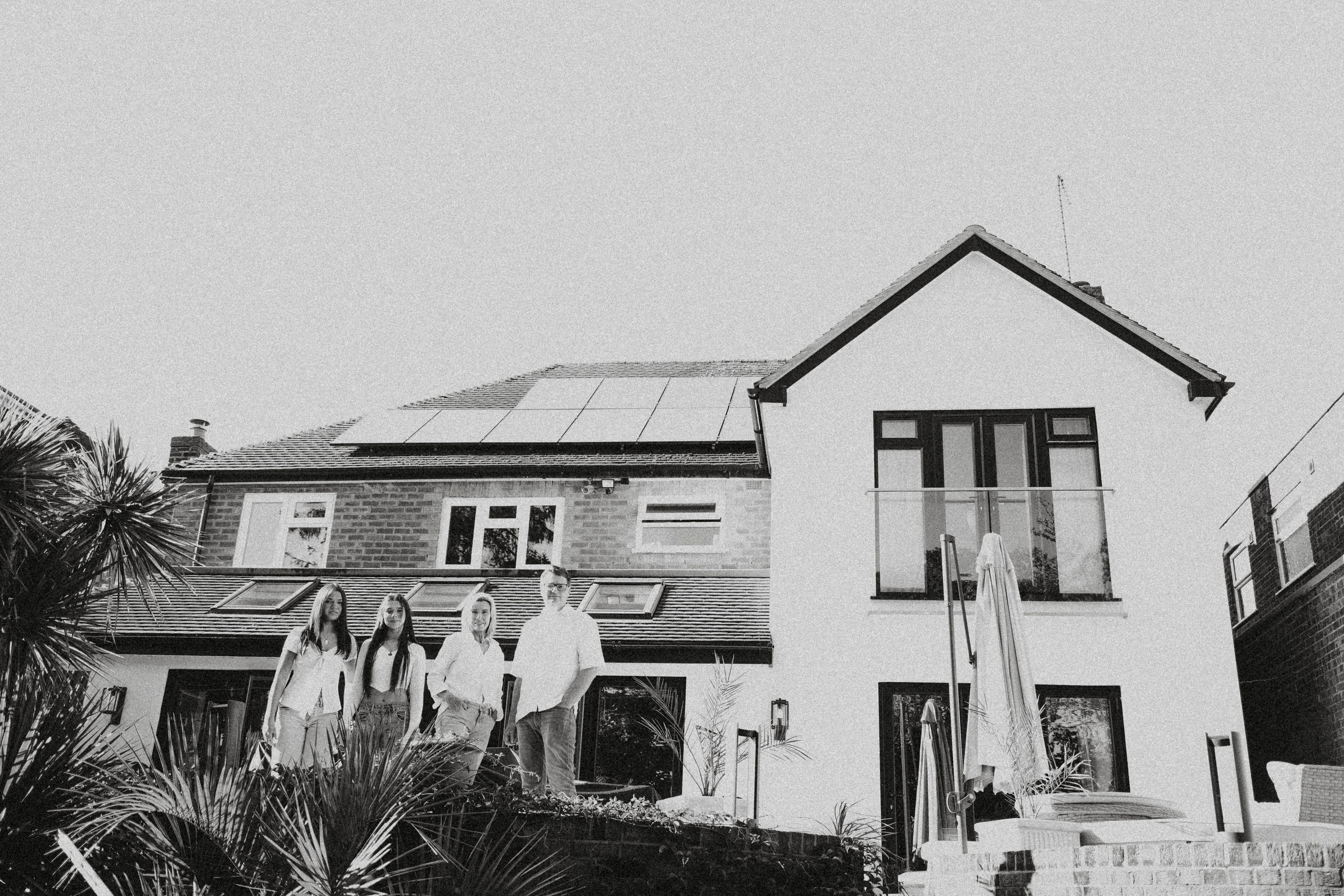 Natural family portraits at home and in the garden Solihull, warm and relaxed atmosphere.