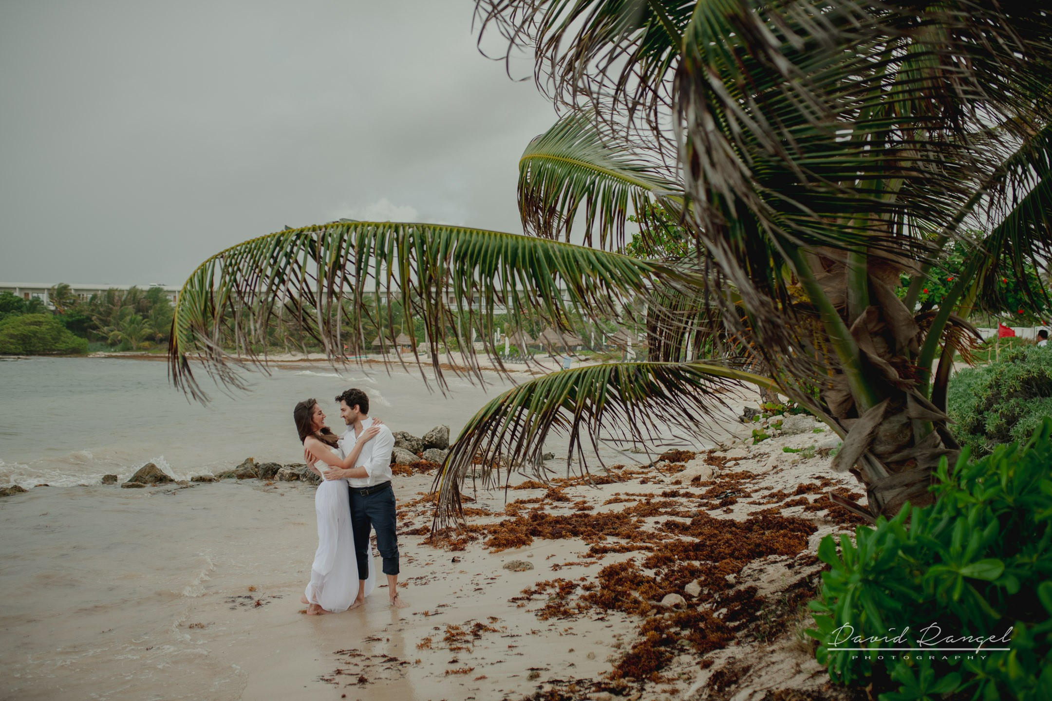 Secilia and Brandon tras the dress at the Conrad Tulum Hotel. Destination wedding photographer based in Cancun and Riviera Maya with service worldwide