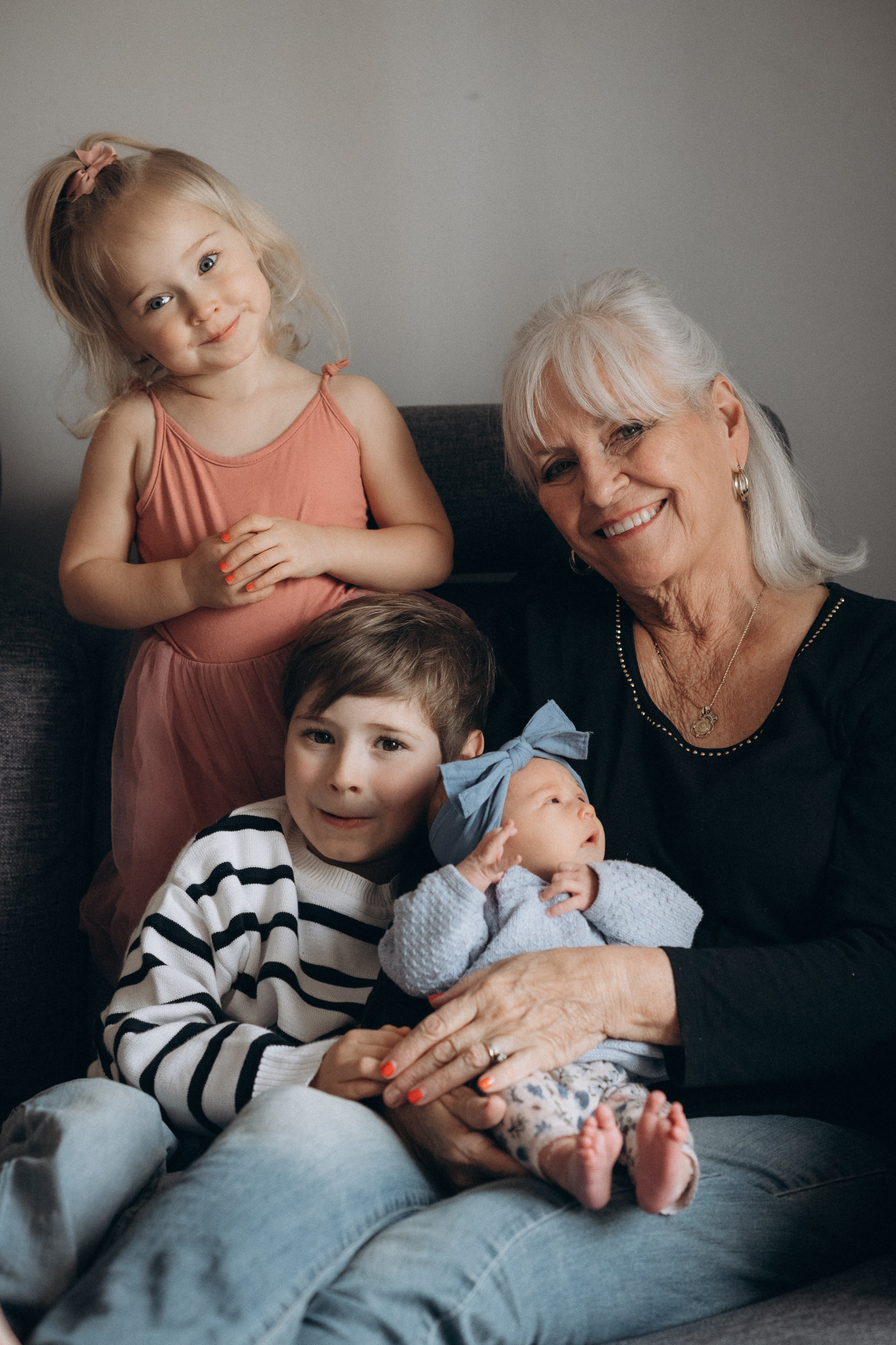 grandmother with grandchildren at home