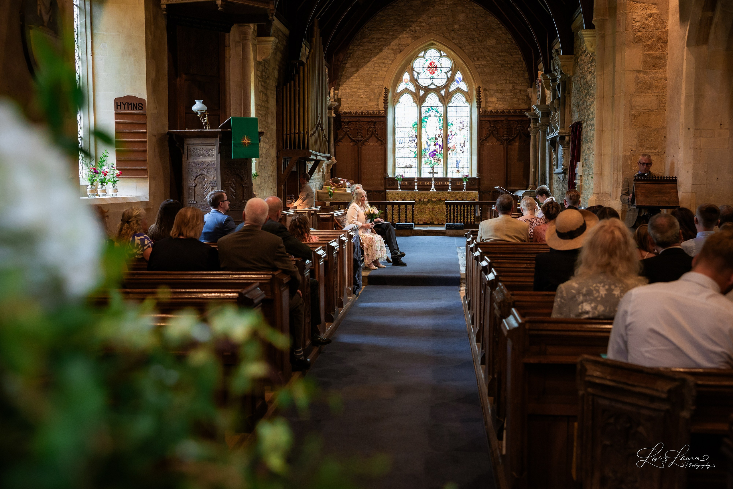 Church Wedding. Wedding and boudoir photography by Liv and Laura