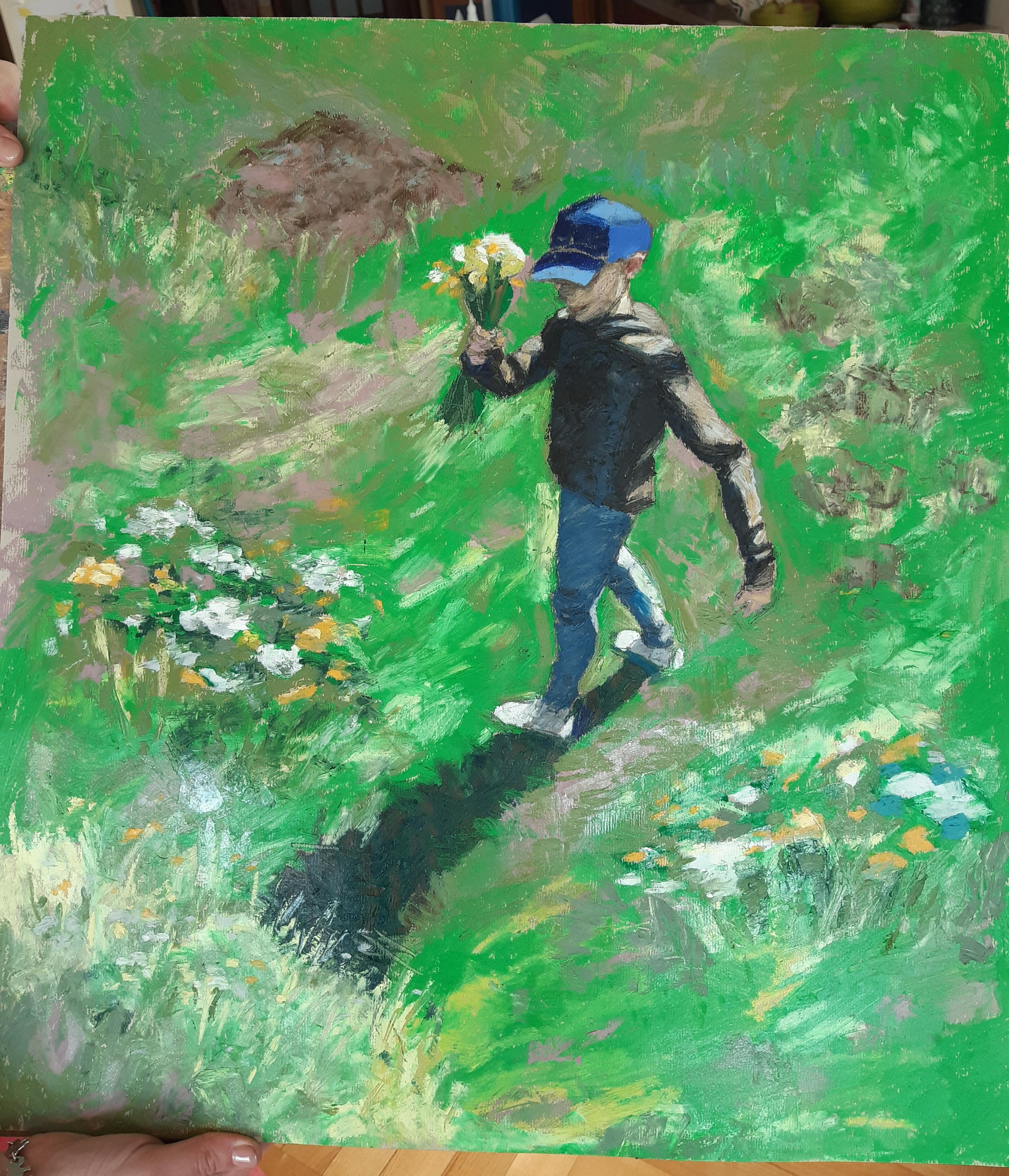 My son collecting flowers on the land for a special event 