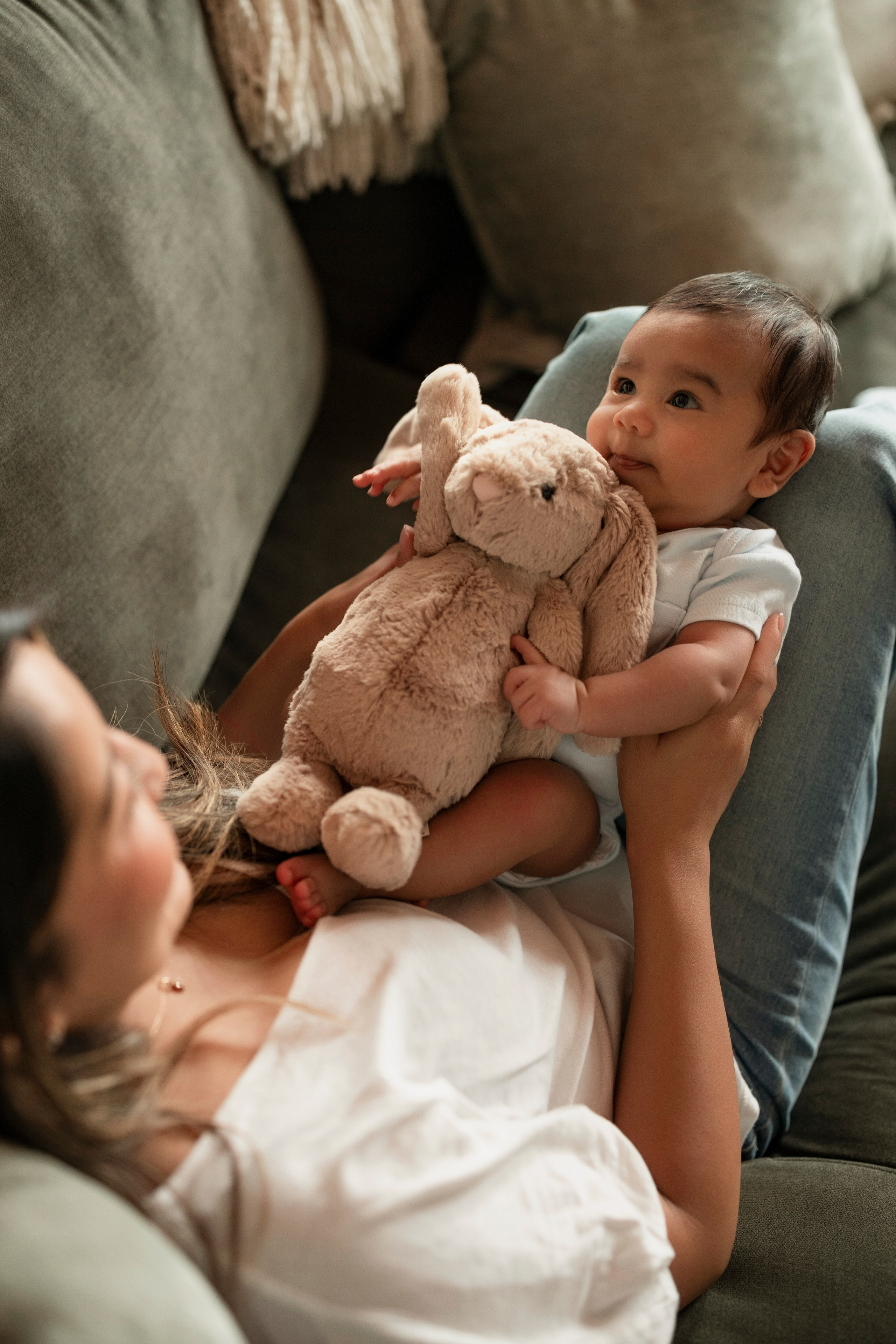 Lifestyle newborn session capturing real family moments